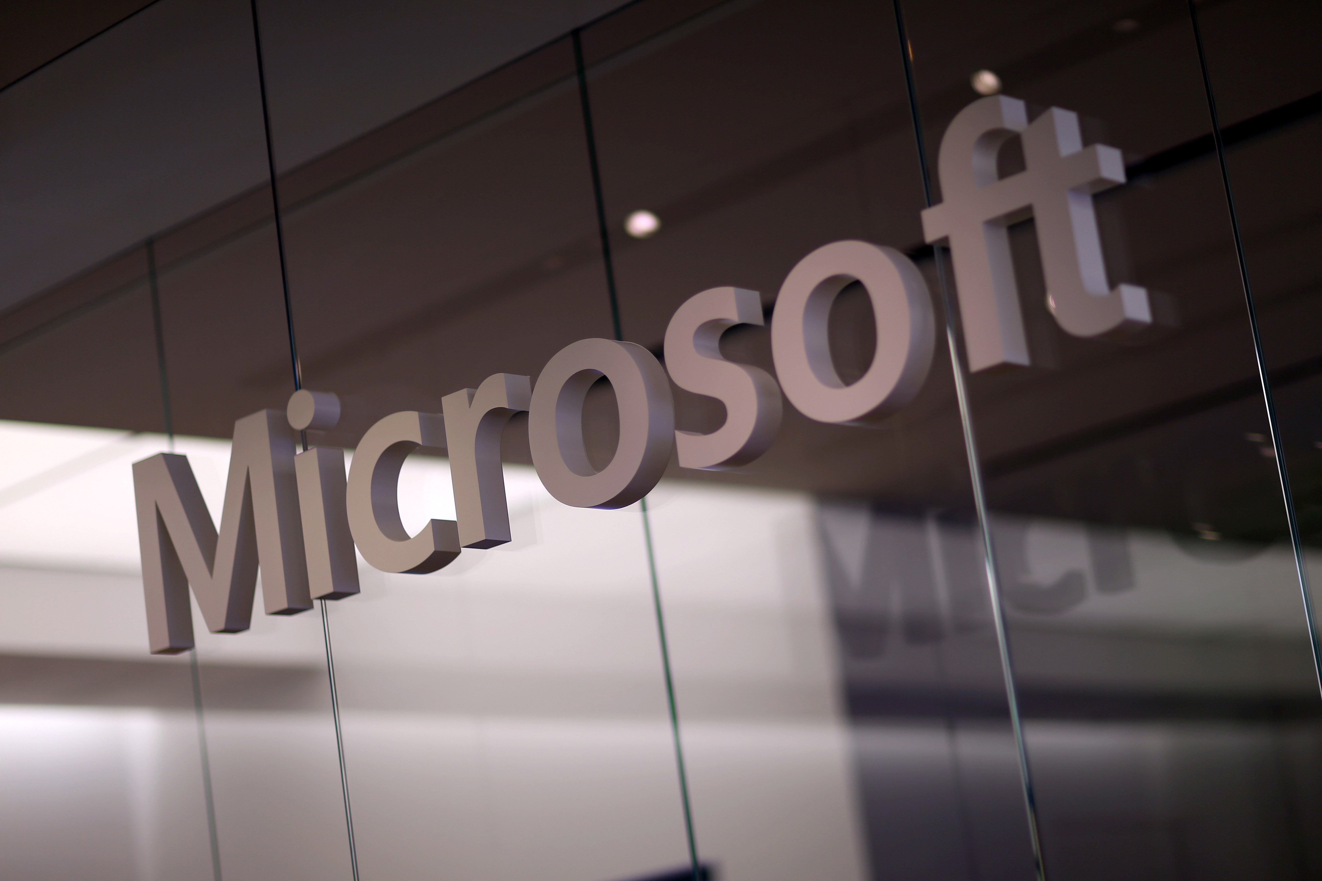 MIAMI, FL - OCTOBER 17:  A Microsoft sign is seen as the new Windows 8.1 operating system is released at a Microsoft store in the Dadeland Mall October 17, 2013 in Miami, Florida.  The update was released a year after Windows 8 was released and includes fixes to some of the problems people experienced with the initial release.  (Photo by Joe Raedle/Getty Images)