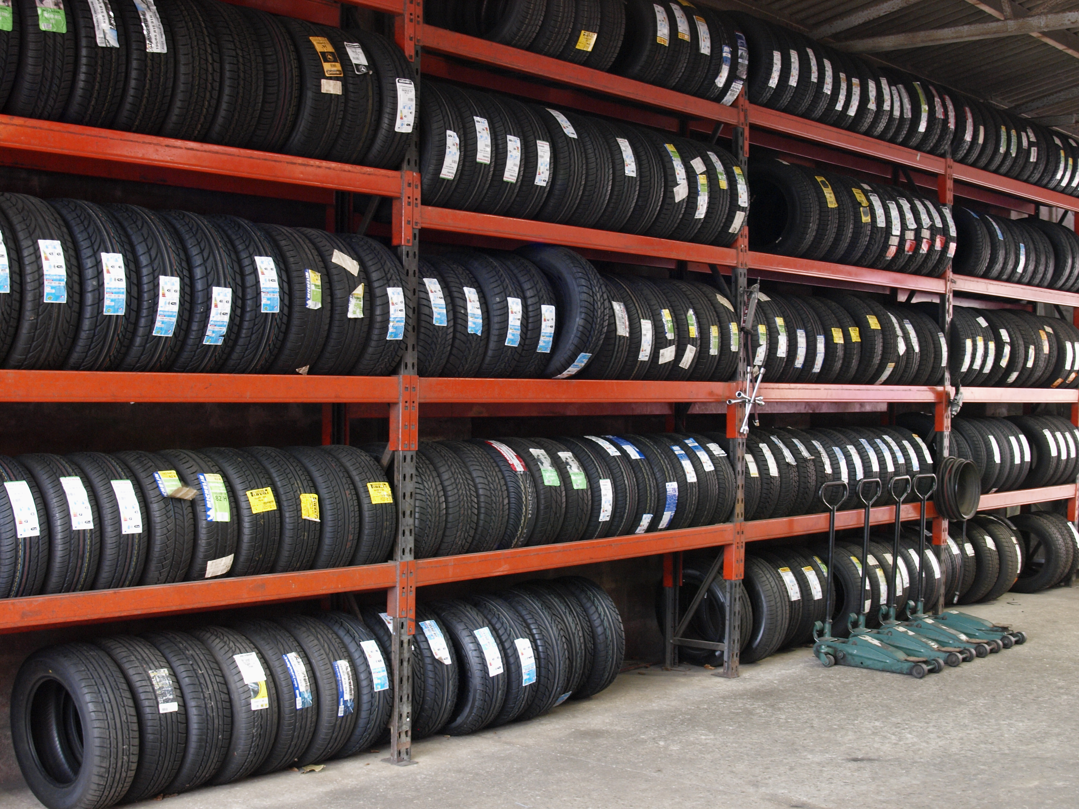 Rows of new tires at a repair center, Bideford, Devon