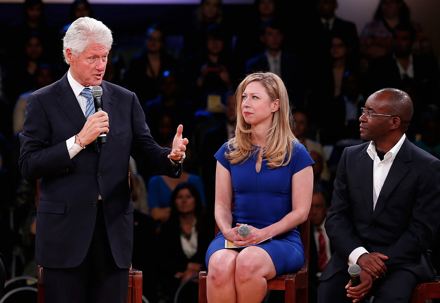Former U.S. president Bill Clinton, left.