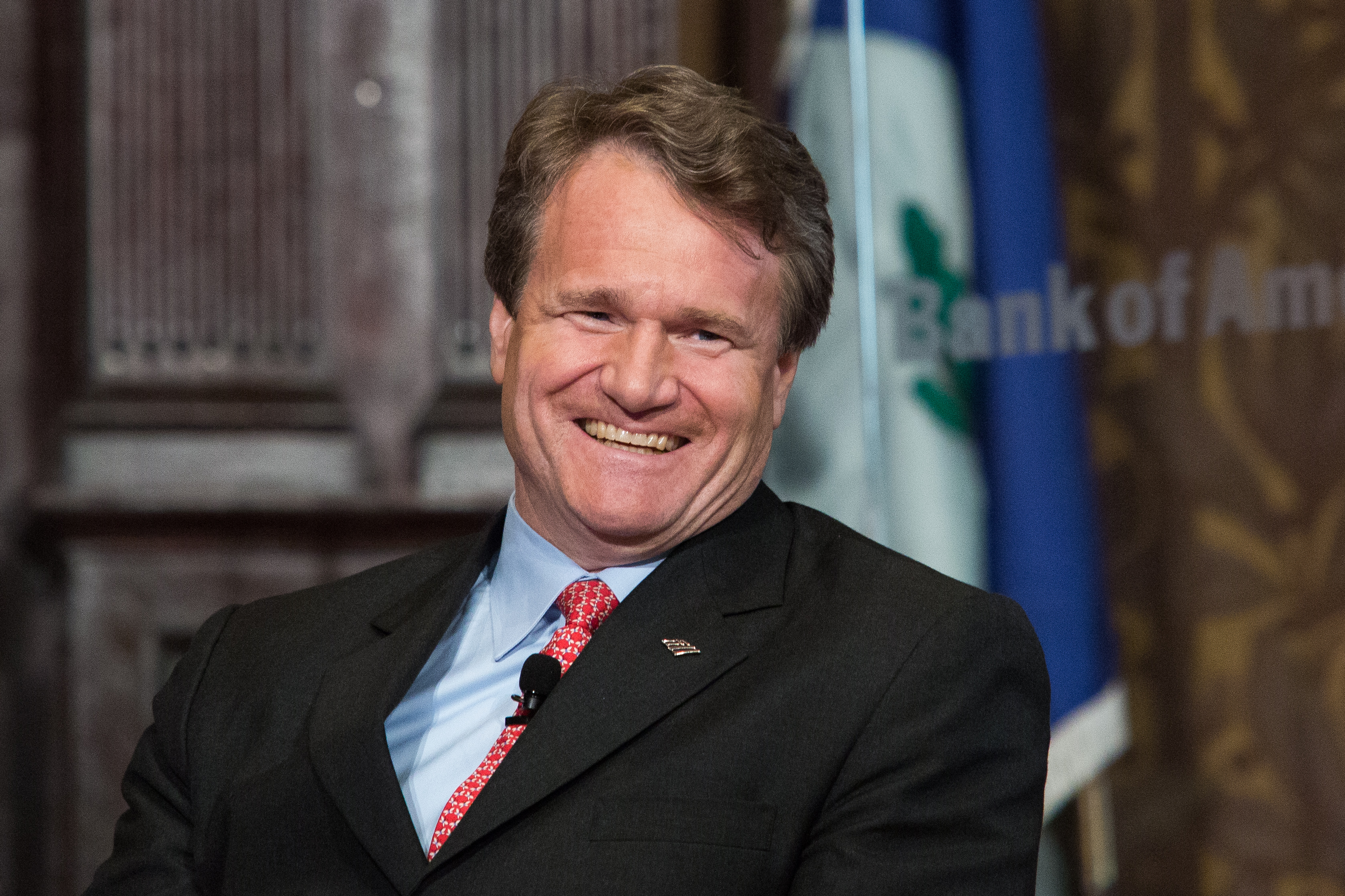 WASHINGTON, DC - SEPTEMBER 19: Bank of America CEO Brian Moynihan smiles while speaking with speaking with Warren Buffett, chairman of the board and CEO of Berkshire Hathaway, in Gaston Hall at Georgetown University, September 19, 2013 in Washington, DC. Buffett also took questions from Georgetown students. (Photo by Drew Angerer/Getty Images)