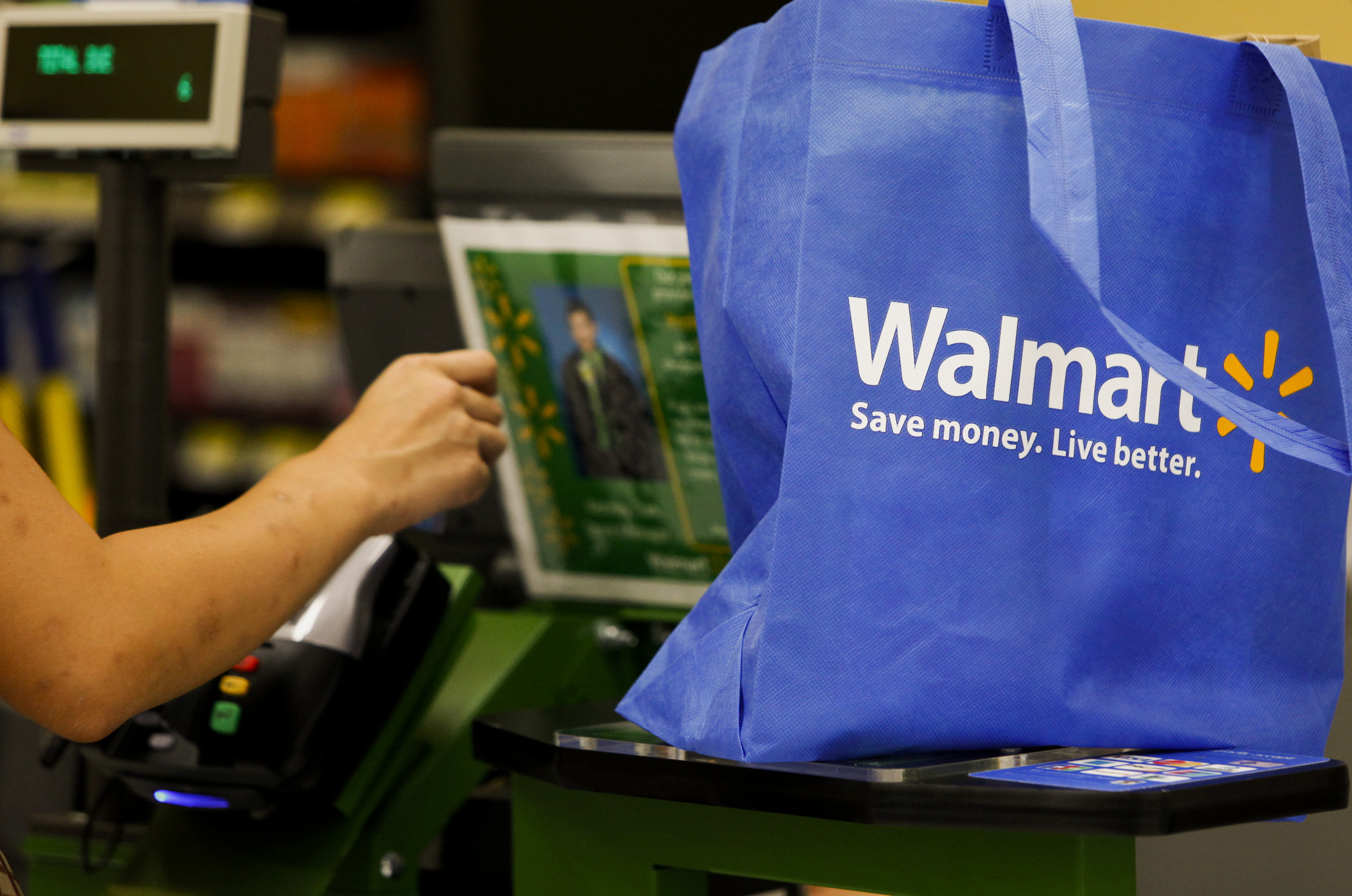 Views Of Shoppers And Products During A Wal-Mart Store Grand Opening