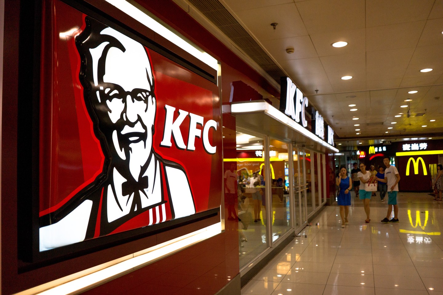 A KFC restaurant in a shopping mall. KFC, McDonalds,