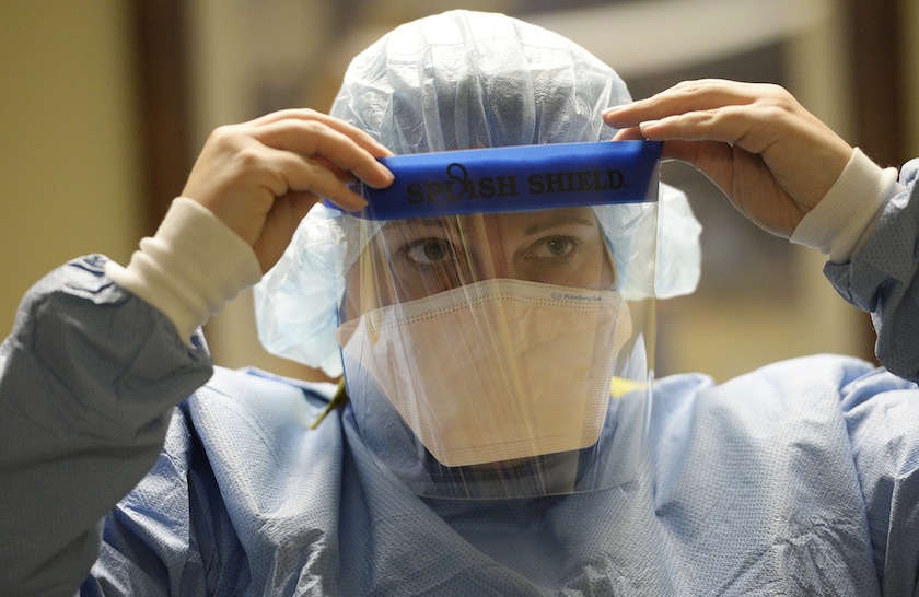 The medical staff at Presbyterian/St. Luke's Medical Center are practicing safe procedures for "donning and doffing" of the  medical protection gear in the event they begin treating ebola patients at the Denver hospital
