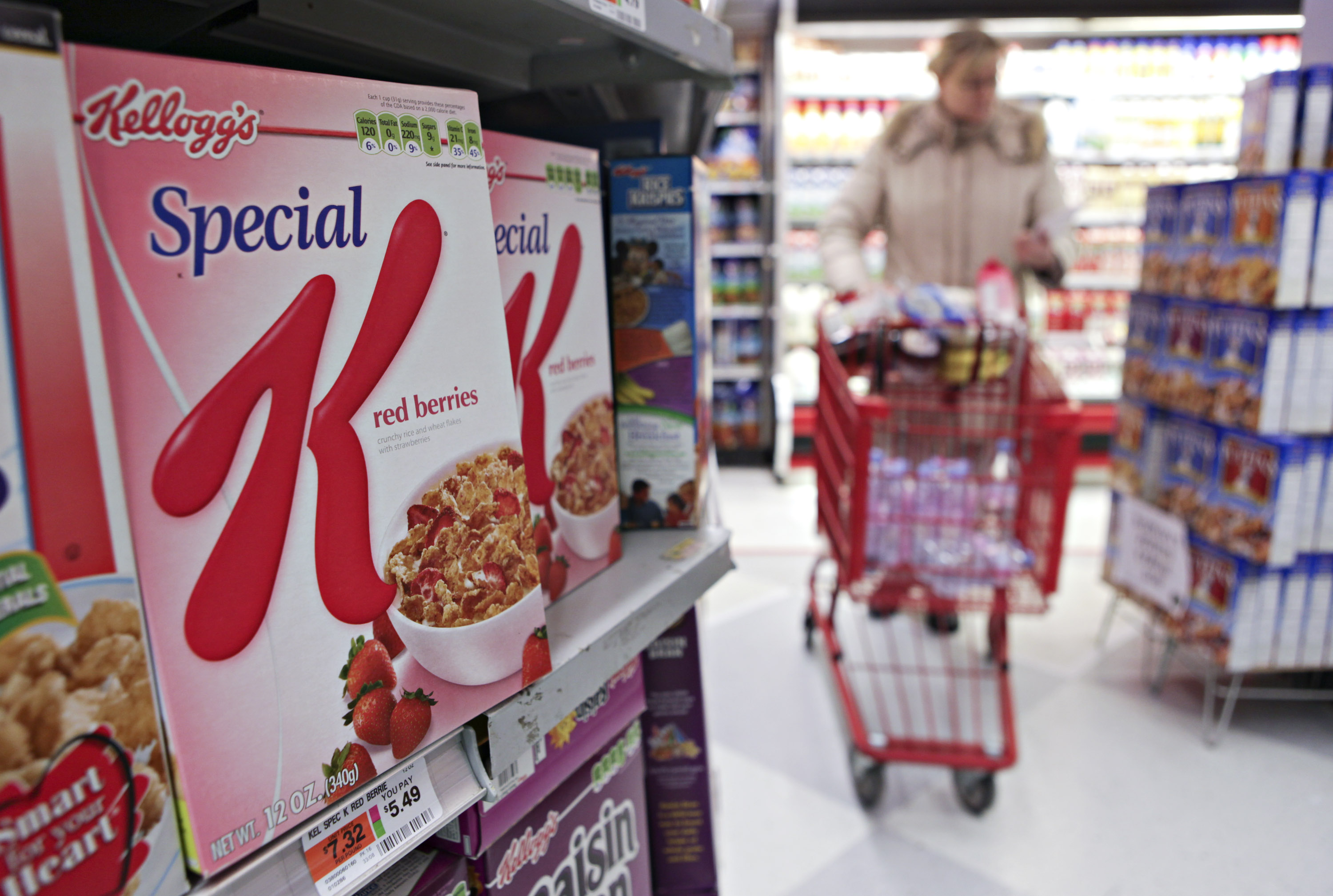 Kellogg's cereal products sit on display in a supermarket in