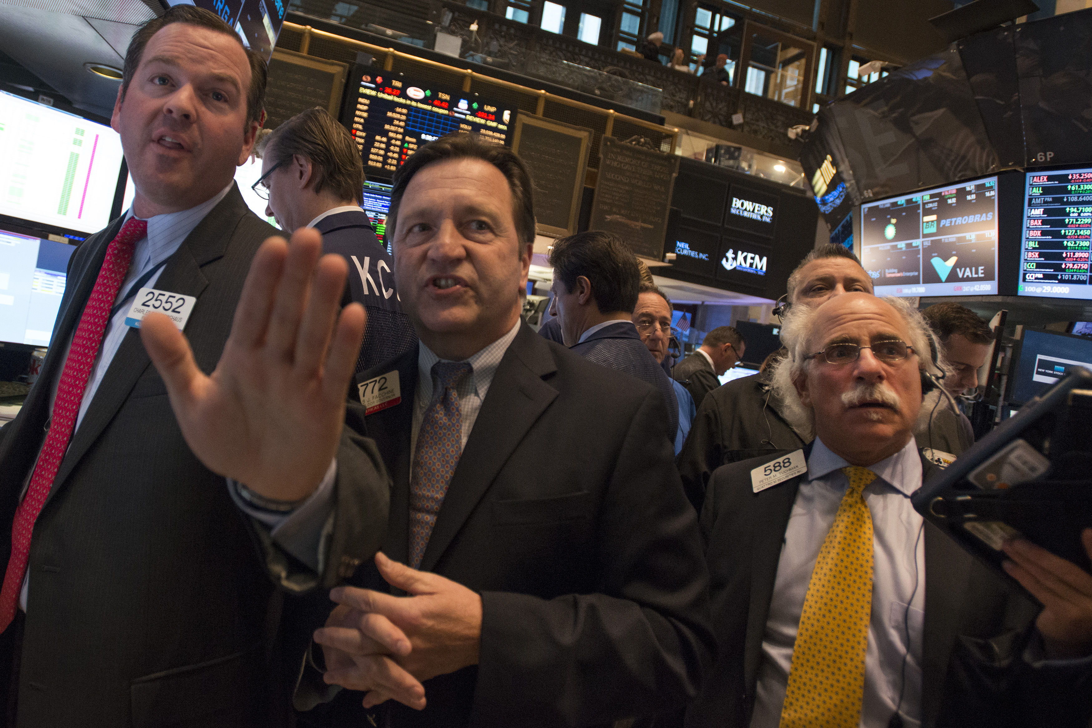 Traders work on the floor before the NYSE Opening Bell in New York