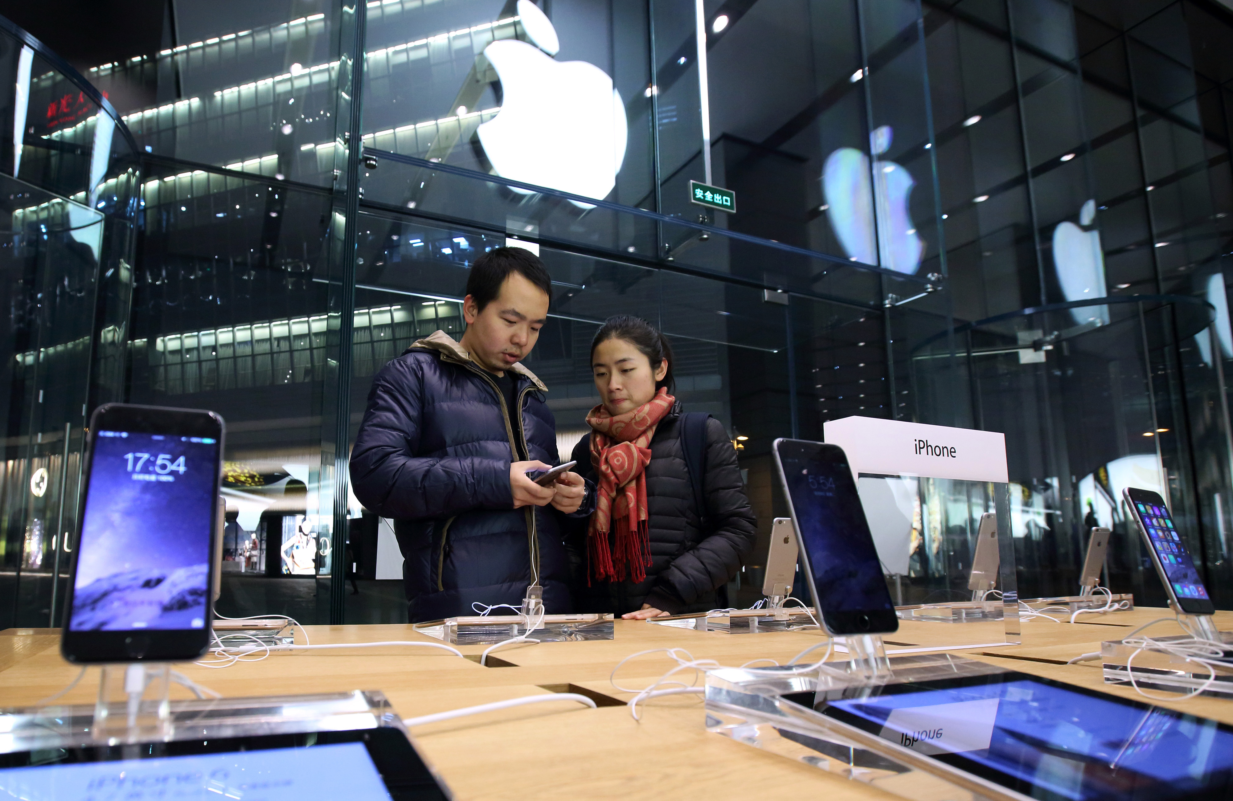 Shoppers And Product Displays Inside The Apple Inc. Store At China Central Mall