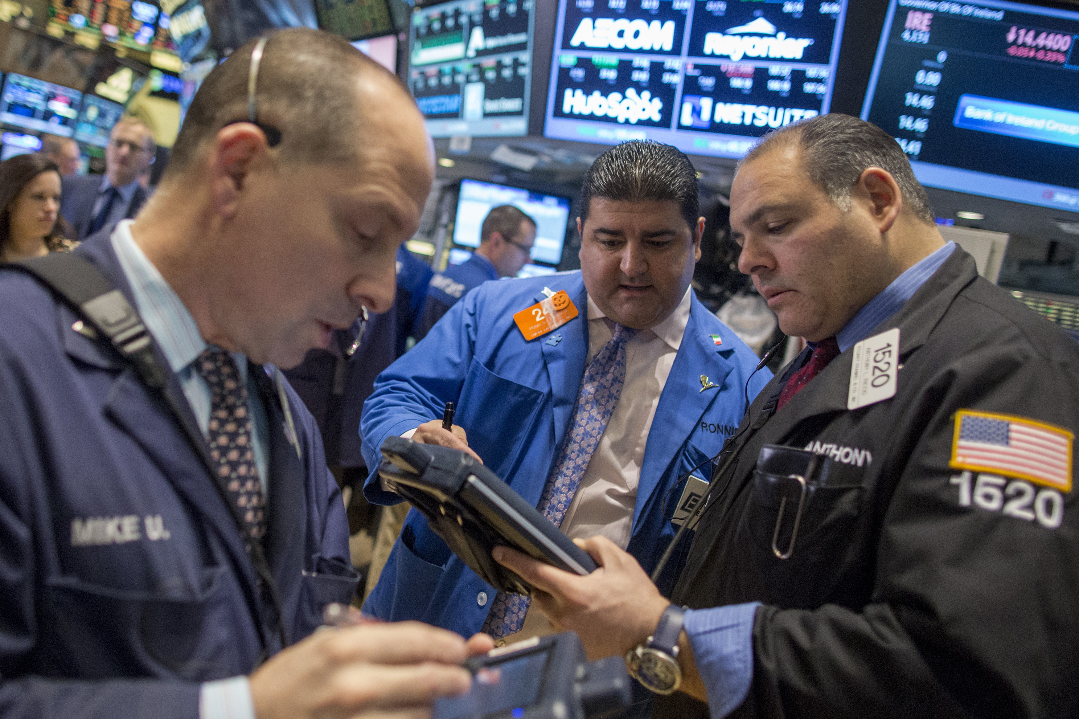 Traders work on the floor of the New York Stock Exchange