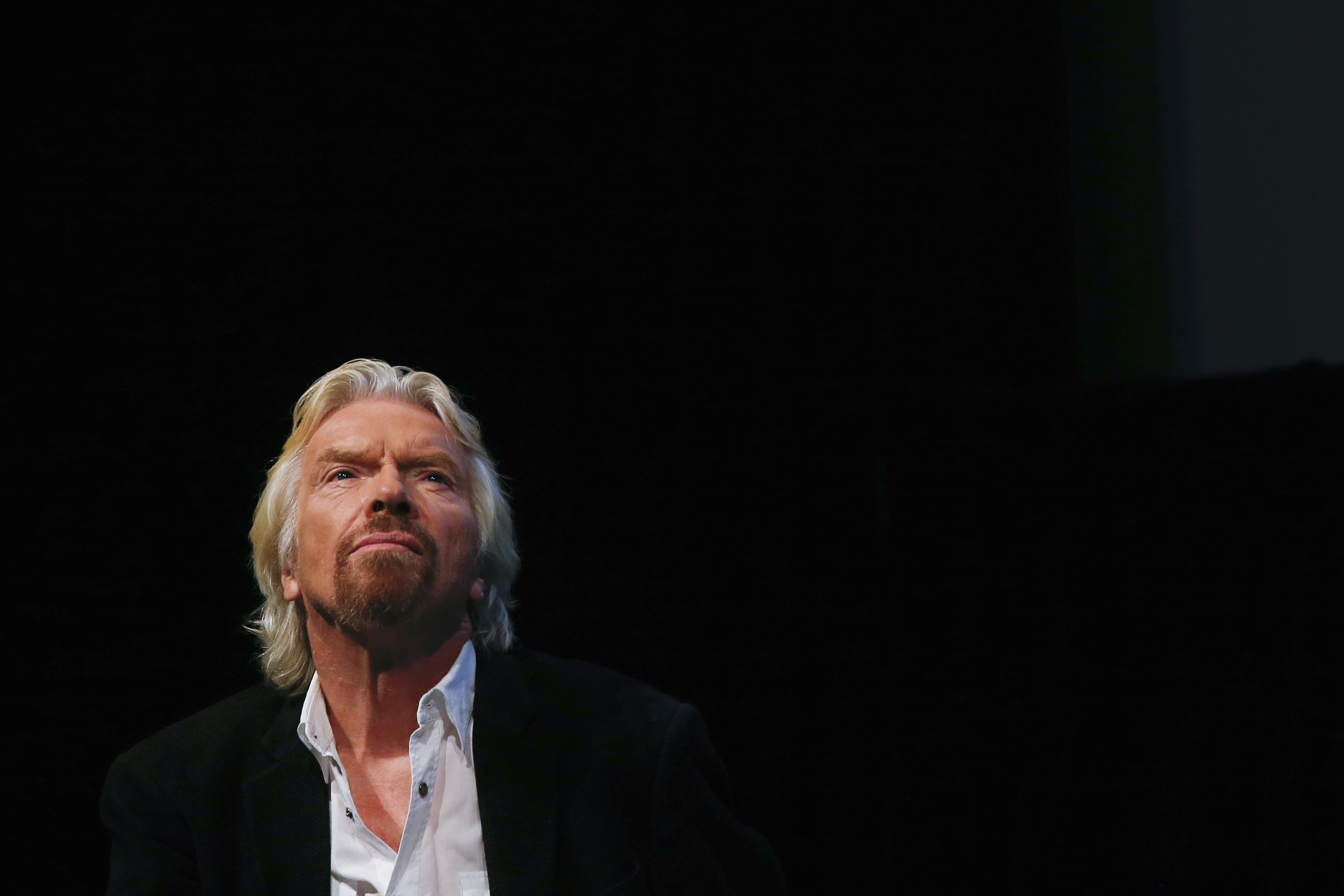 Sir Richard Branson listens to a speaker at the Global Commission on Drug Policy in New York