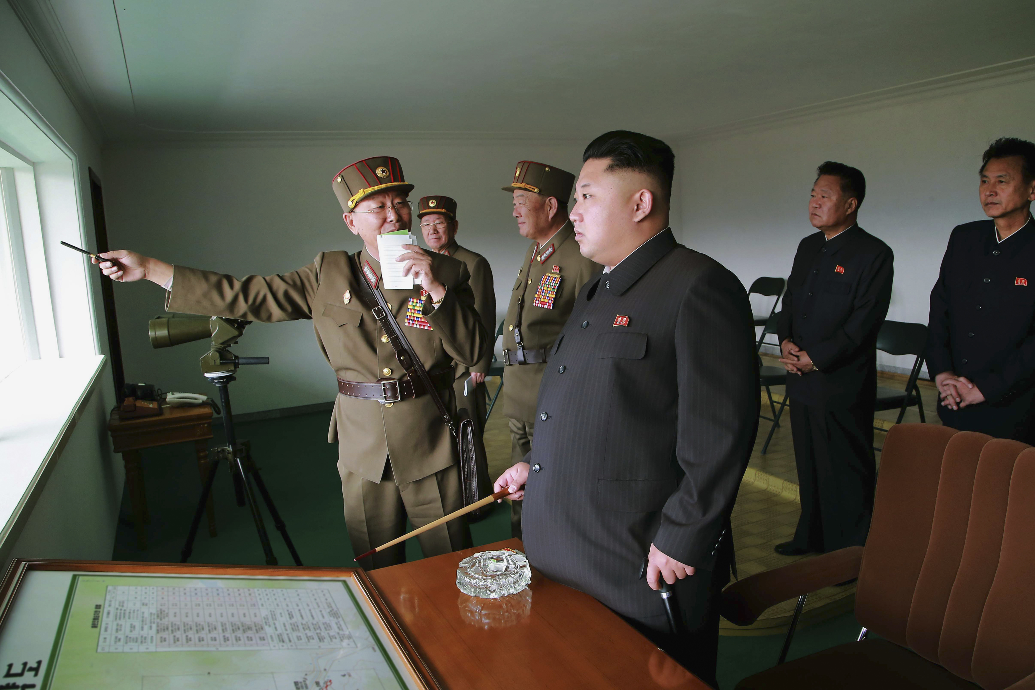 North Korean leader Kim Jong-Un attends a military drill between KPA Large Combined Unit 526 and KPA Combined Unit 478