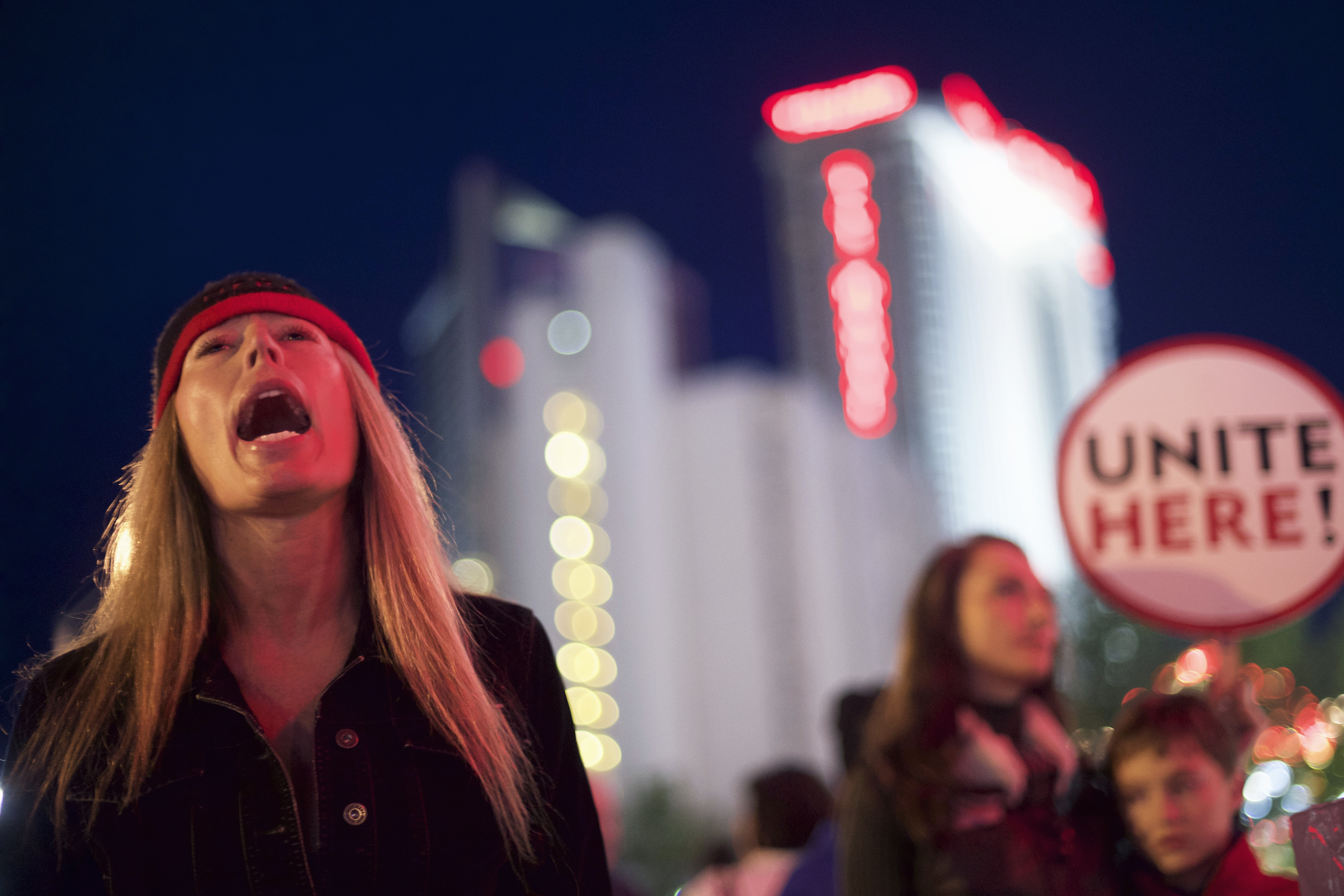 Union members from UNITE HERE Local 54 rally outside the Trump Taj Mahal Casino in Atlantic City, New Jersey