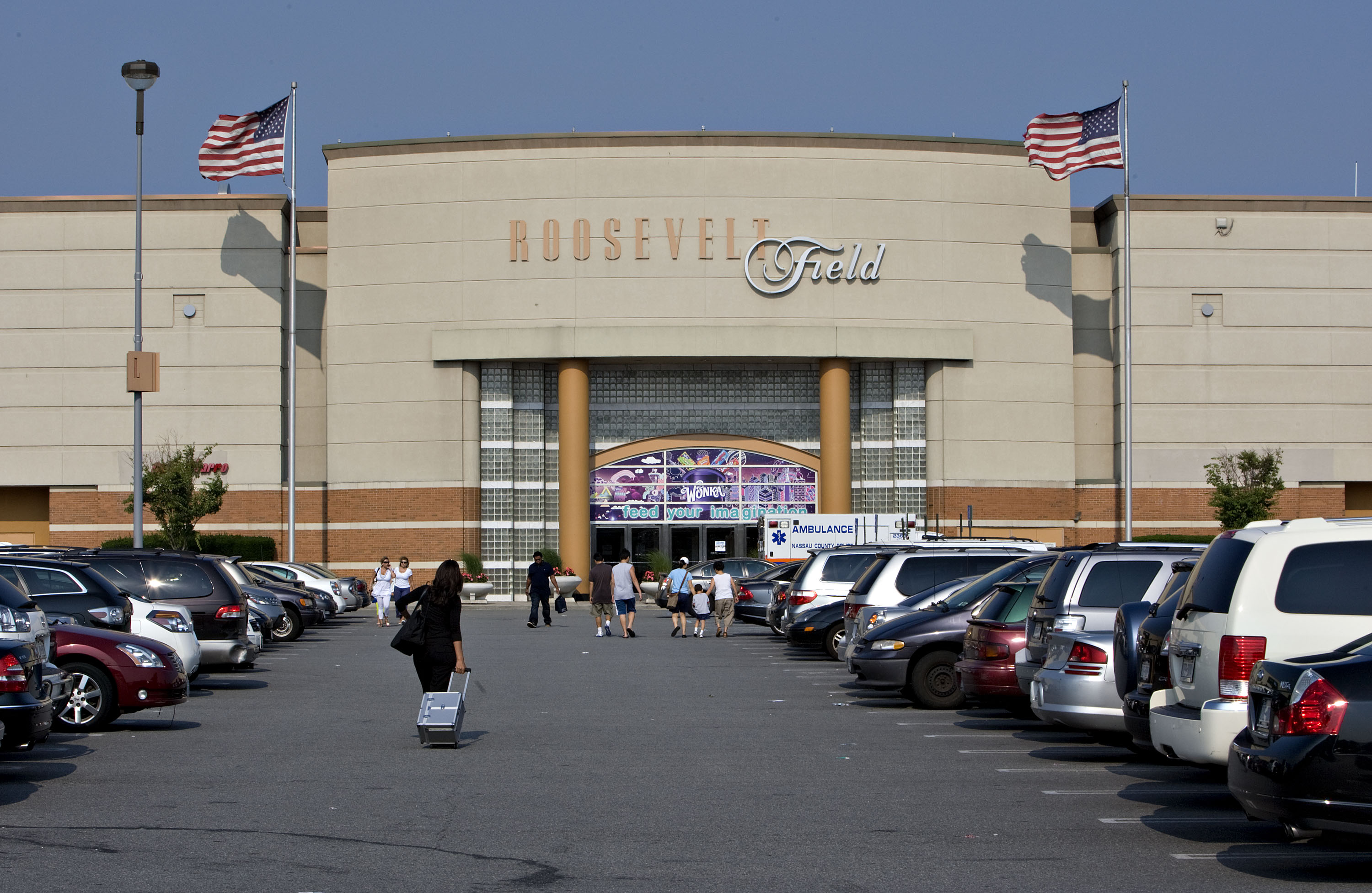 Shoppers enter Roosevelt Field Mall in Garden City, New York