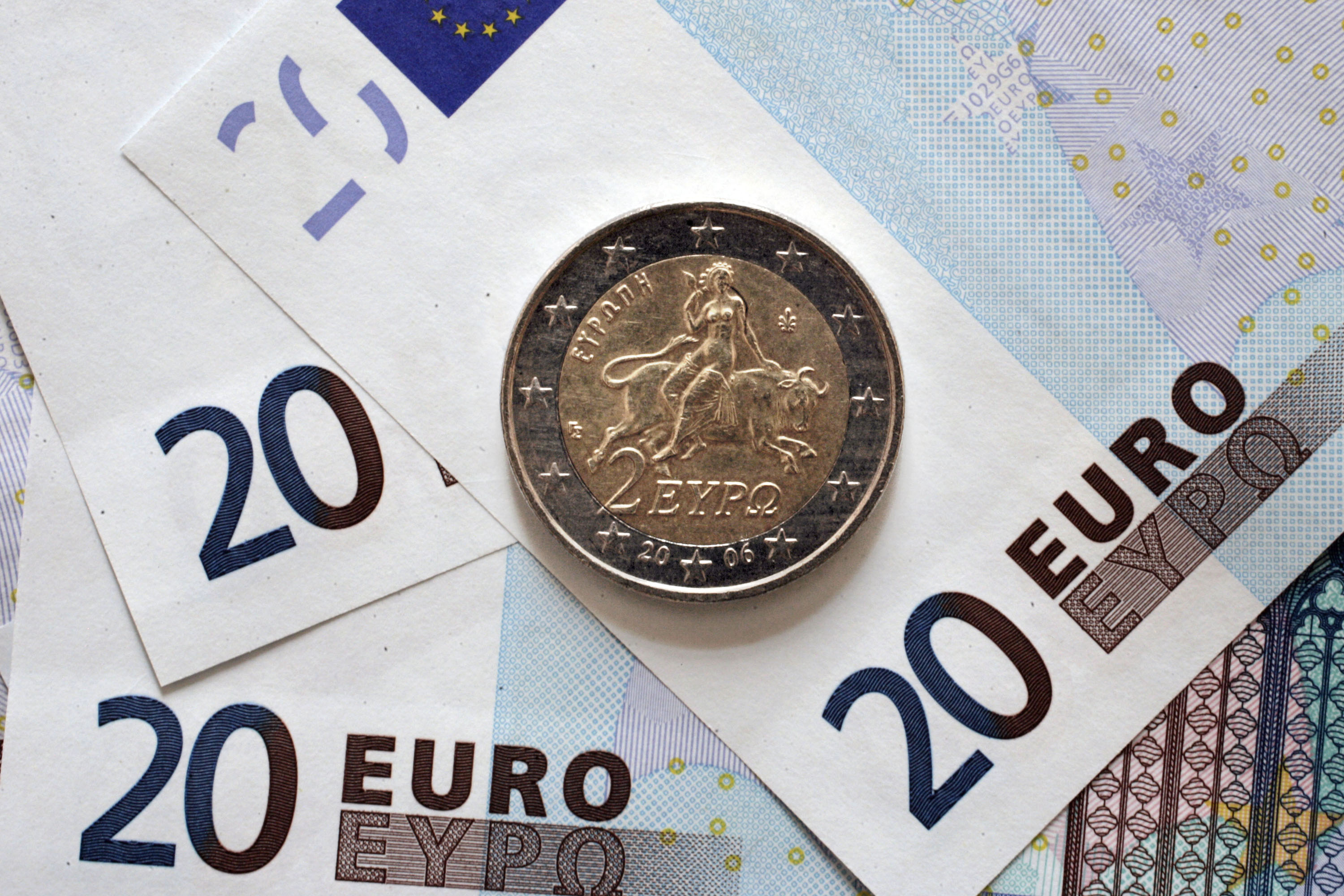ATHENS, GREECE , JANUARY 12: Euro coins with a Greek symbols on Monday 12. 2015 in Athens.Photo by MIlos Bicanski/Getty Images