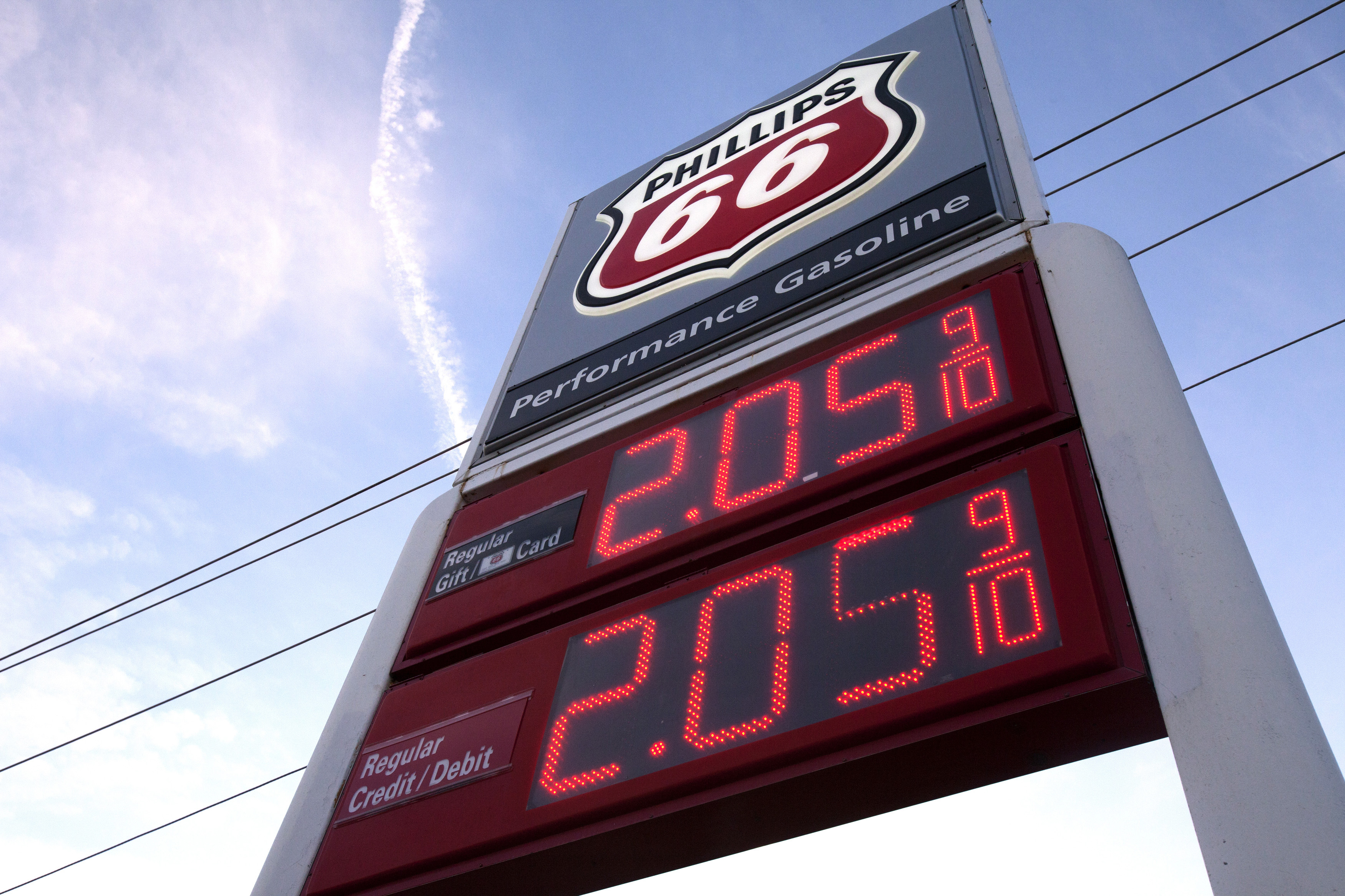 A gas price sign is seen at a Phillips 66 station on Westheimer Road in Houston, Texas
