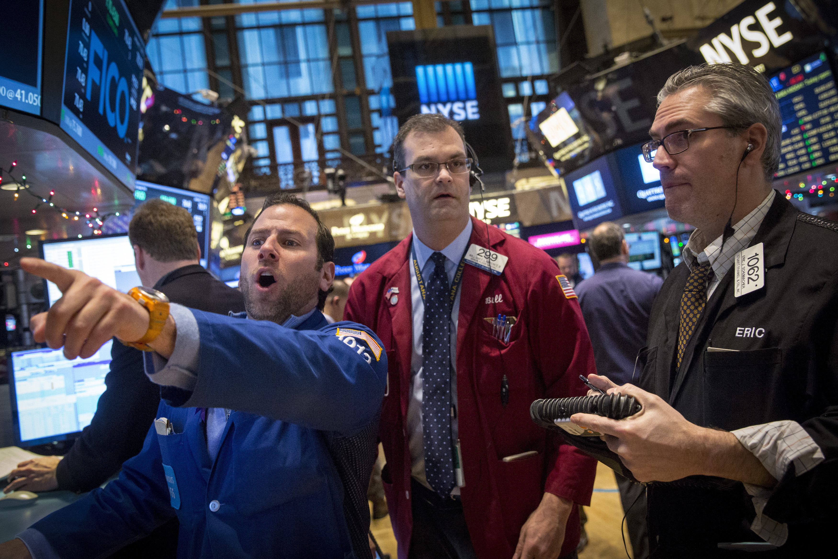 Specialist trader Mike Pistillo works on the floor of the New York Stock Exchange