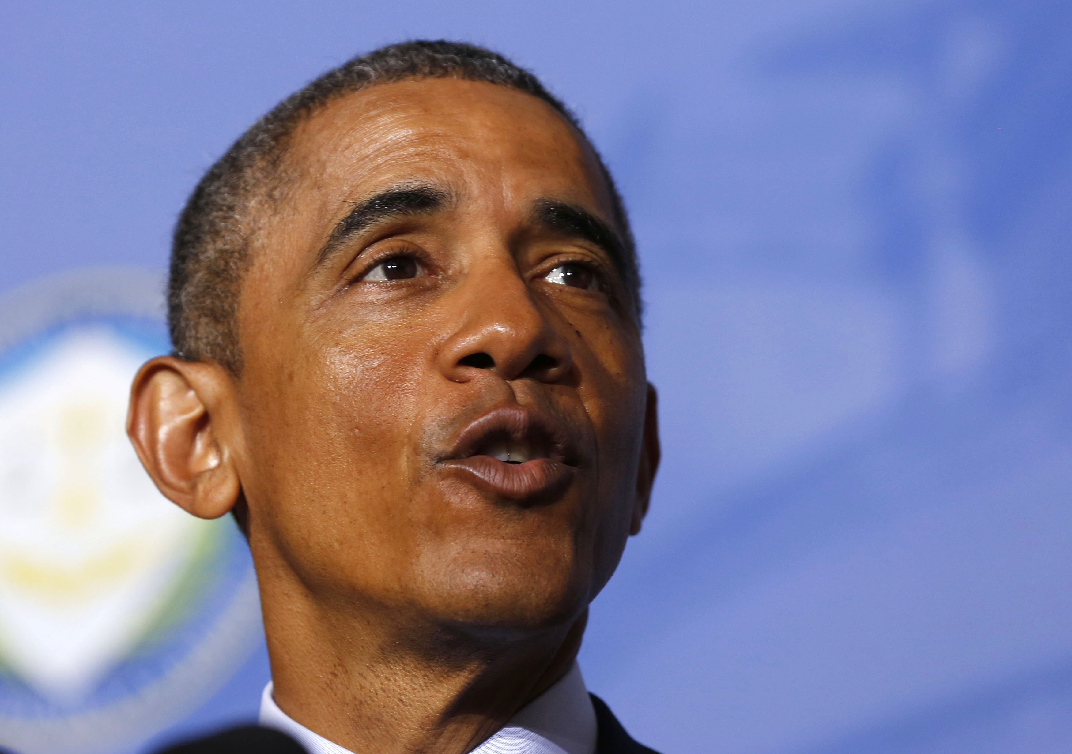 U.S. President Barack Obama pauses as he talks about his Administration's Buy Secure Initiative on consumer financial protection while at the Federal Trade Commission in Washington