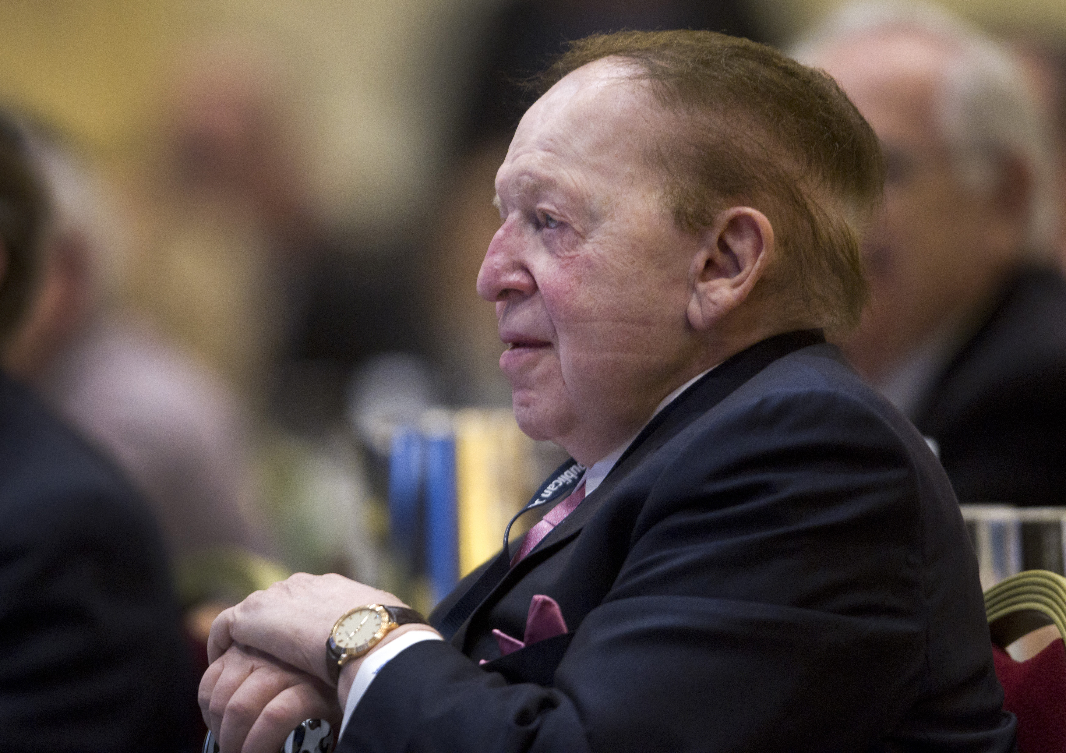 Adelson, chairman of the board and chief executive officer of Las Vegas Sands Corp., listens to New Jersey Governor Chris Christie during the Republican Jewish Coalition Spring Leadership Meeting at the Venetian Resort in Las Vegas