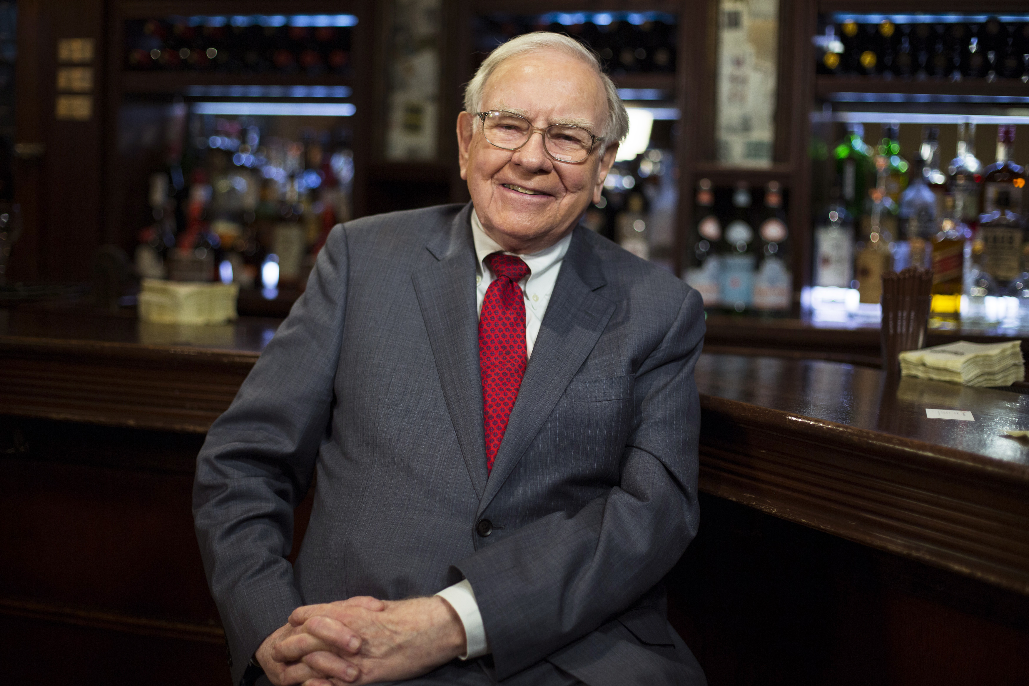 Investor Warren Buffett poses for a portrait during an interview after a luncheon to benefit the Glide Foundation of San Francisco in New York