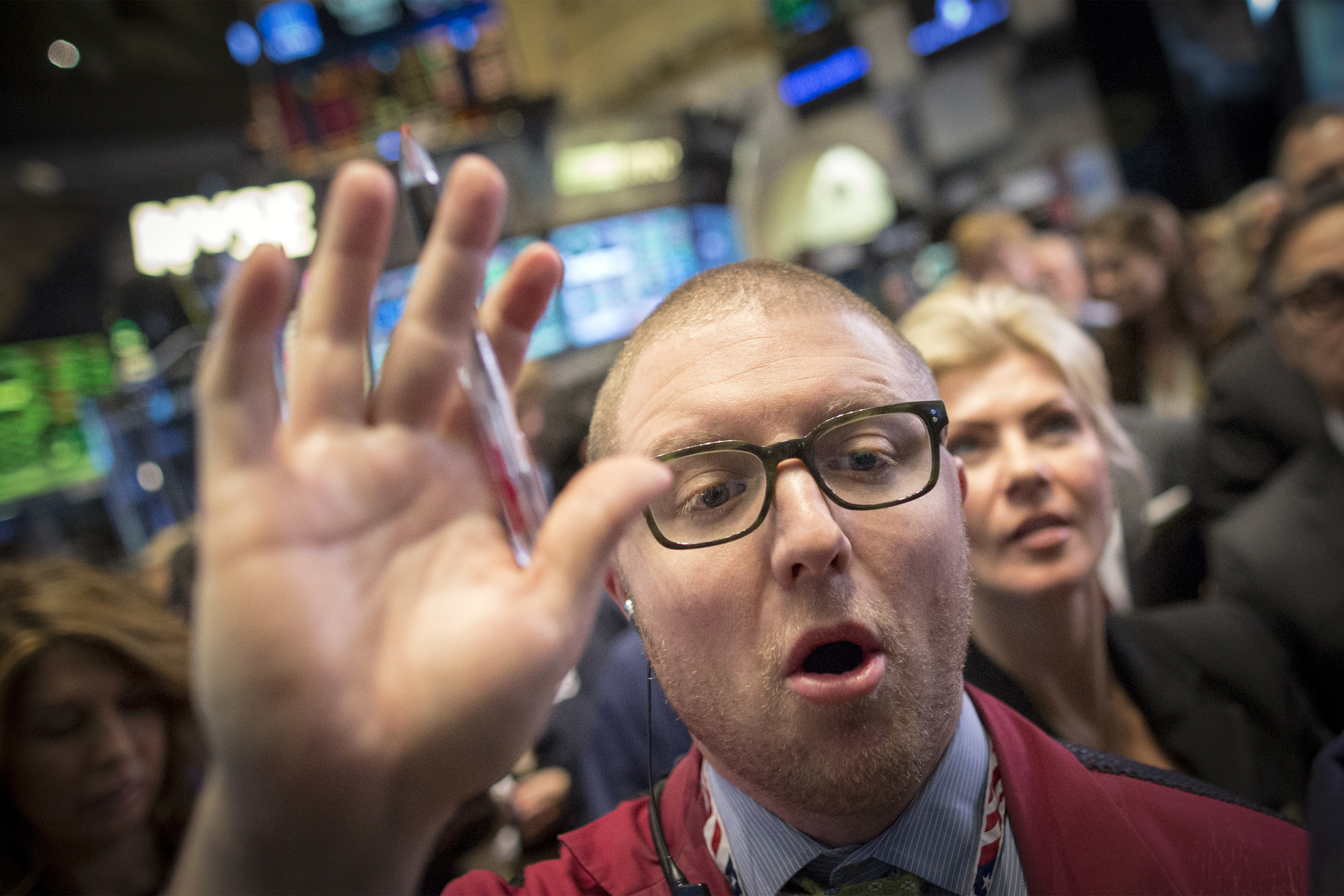 Traders work on the floor of the New York Stock Exchange