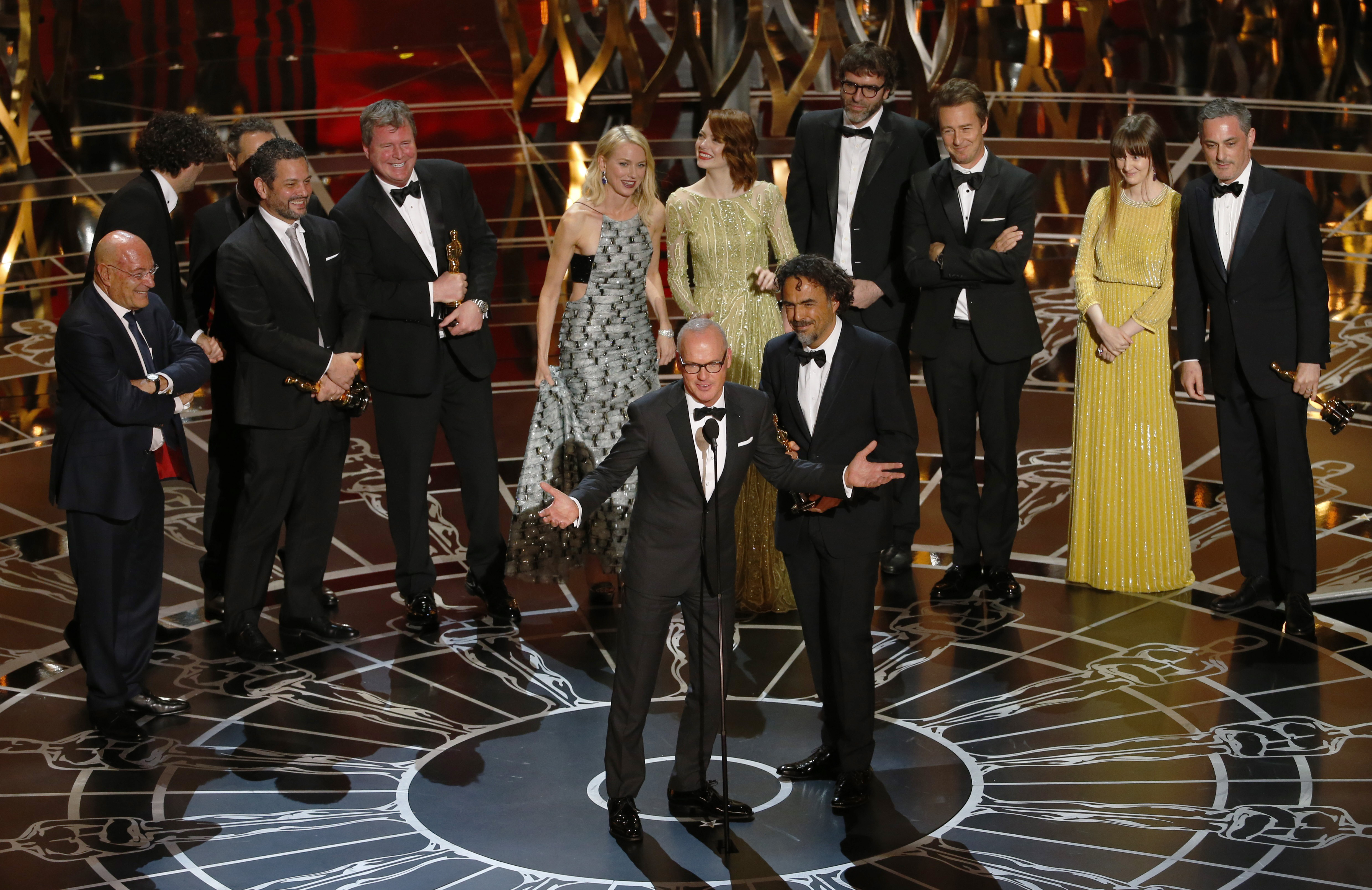 Actor Keaton and director Inarritu accept the Oscar for best picture for his film "Birdman"during the 87th Academy Awards in Hollywood