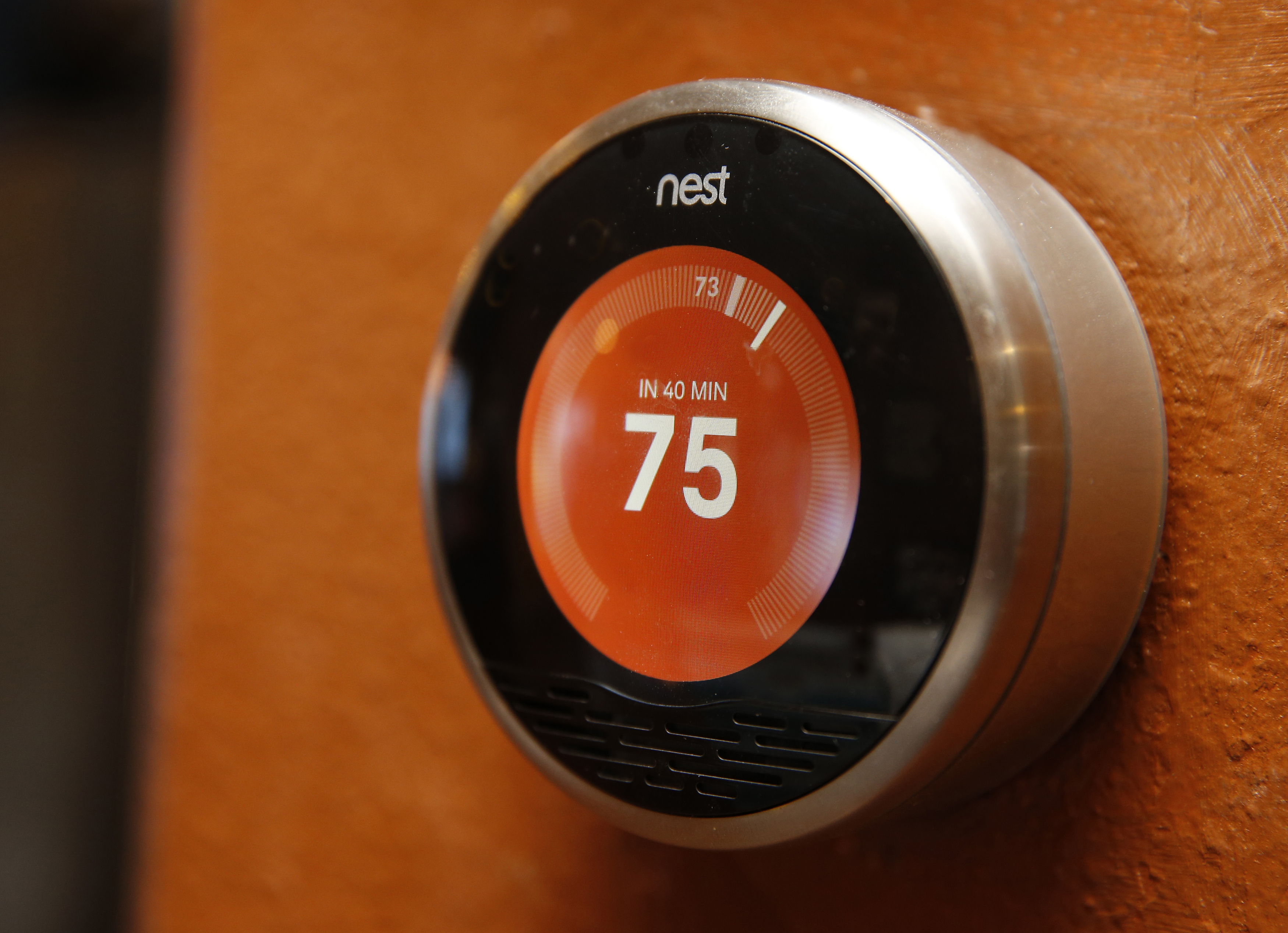 A Nest thermostat is installed in a home in Provo