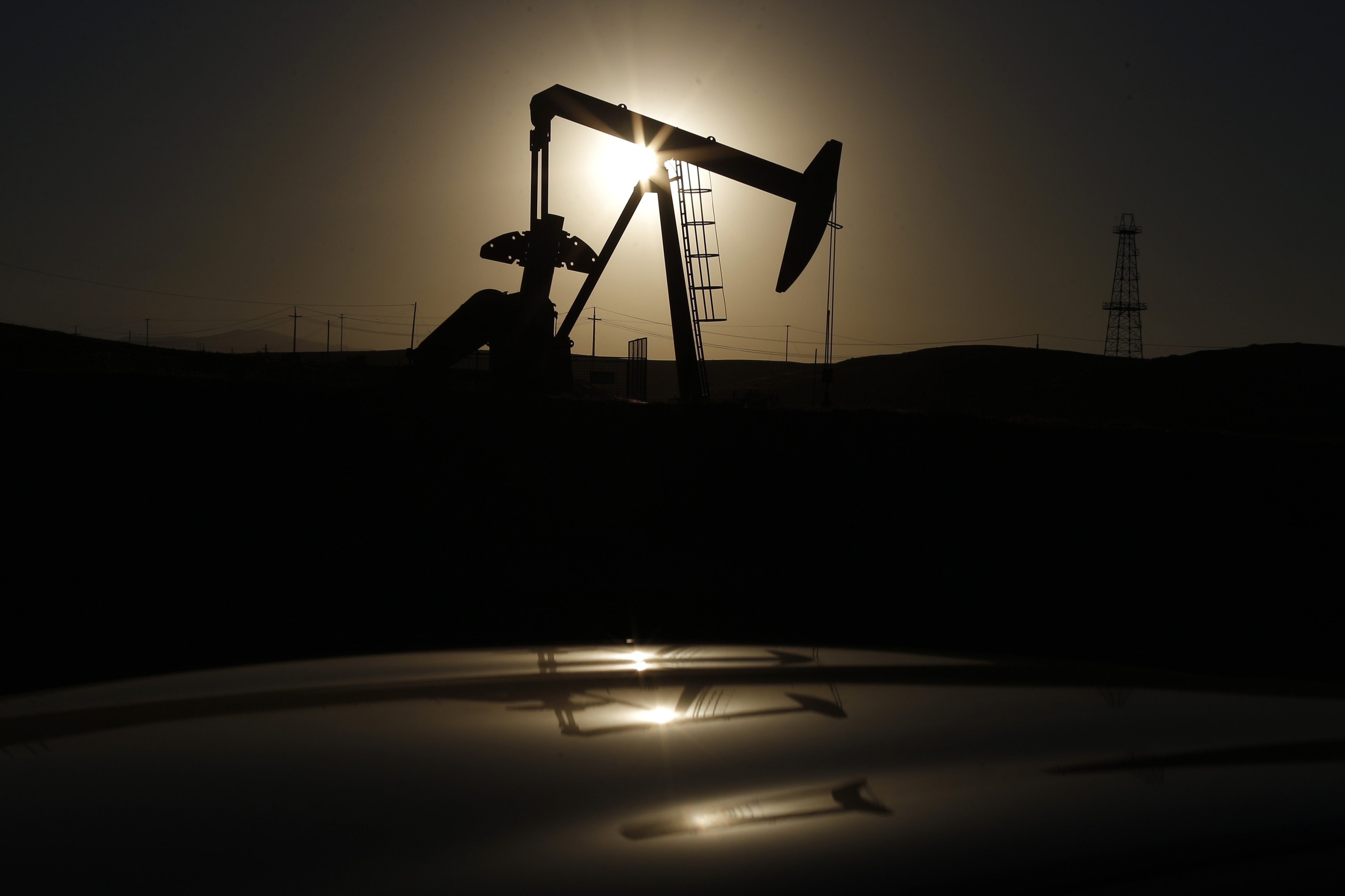 A pump jack is seen at sunrise near Bakersfield