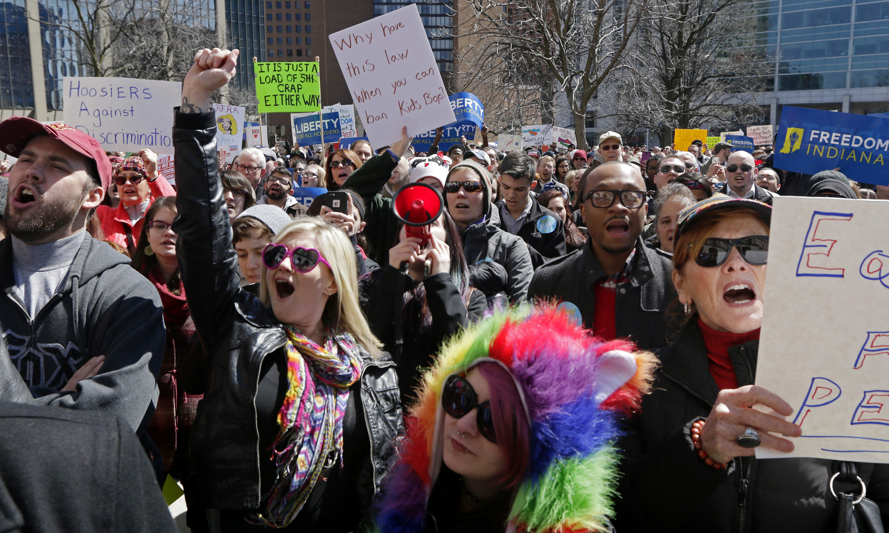 Demonstrators gather to protest a controversial religious freedom bill in Indianapolis