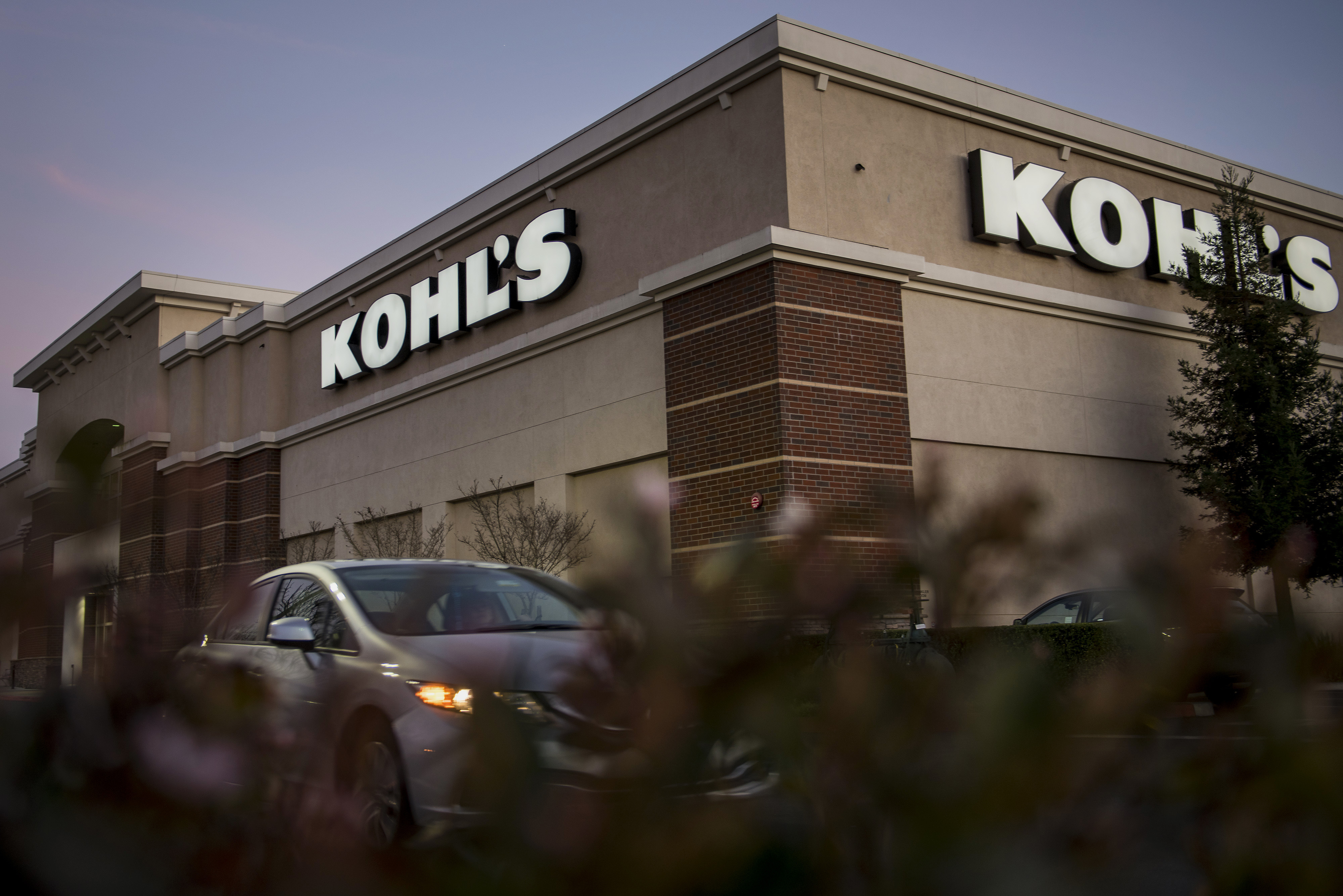 Kohl's Corp. signage is seen on the facade of a store in Concord, California, U.S., on Tuesday, Feb. 24, 2015. Kohl's Corp. is expected to release earnings figures on Feb. 26. Photographer: David Paul Morris/Bloomberg