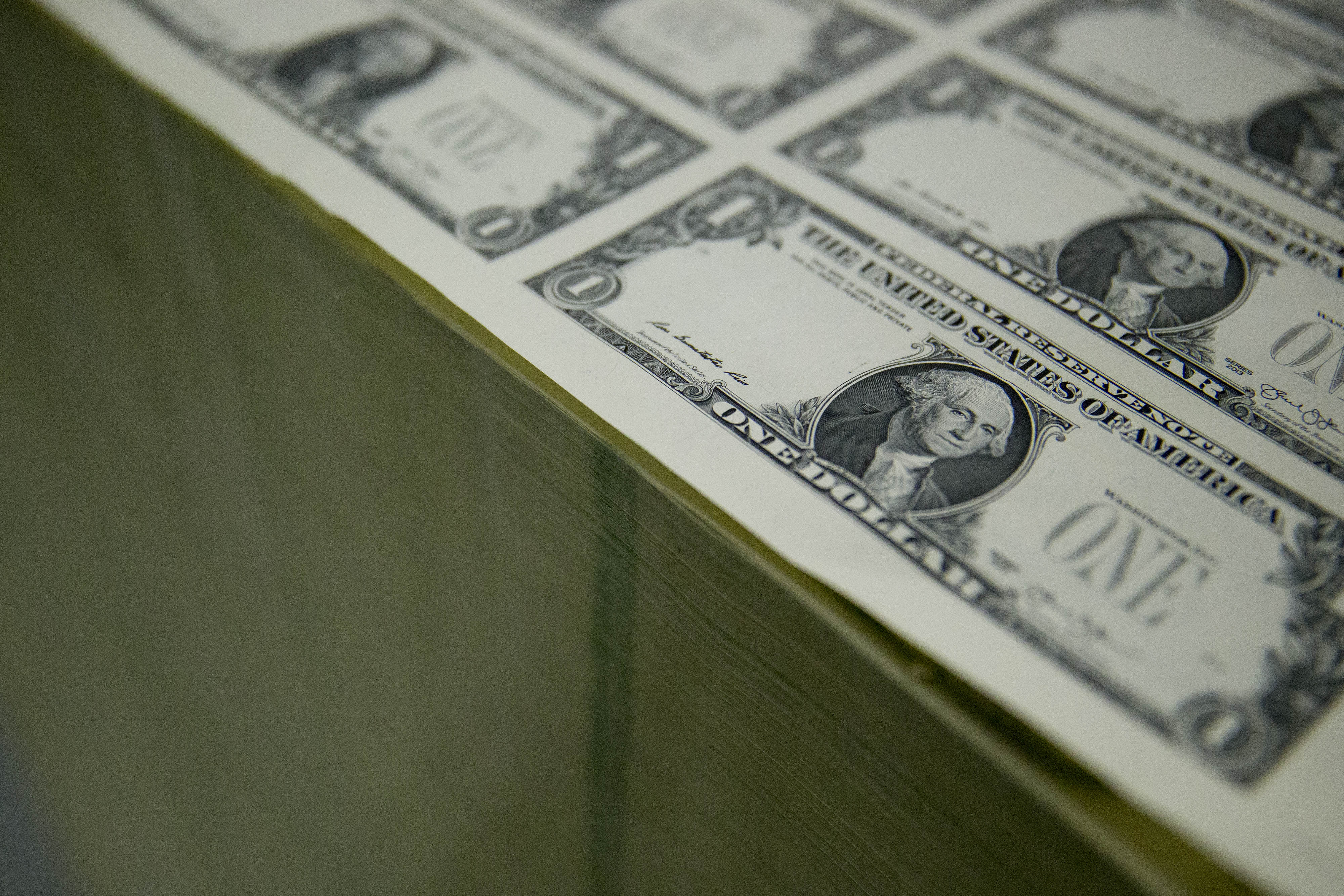 Operations At The Bureau Of Engraving And Printing As The $1 Bill Is Printed