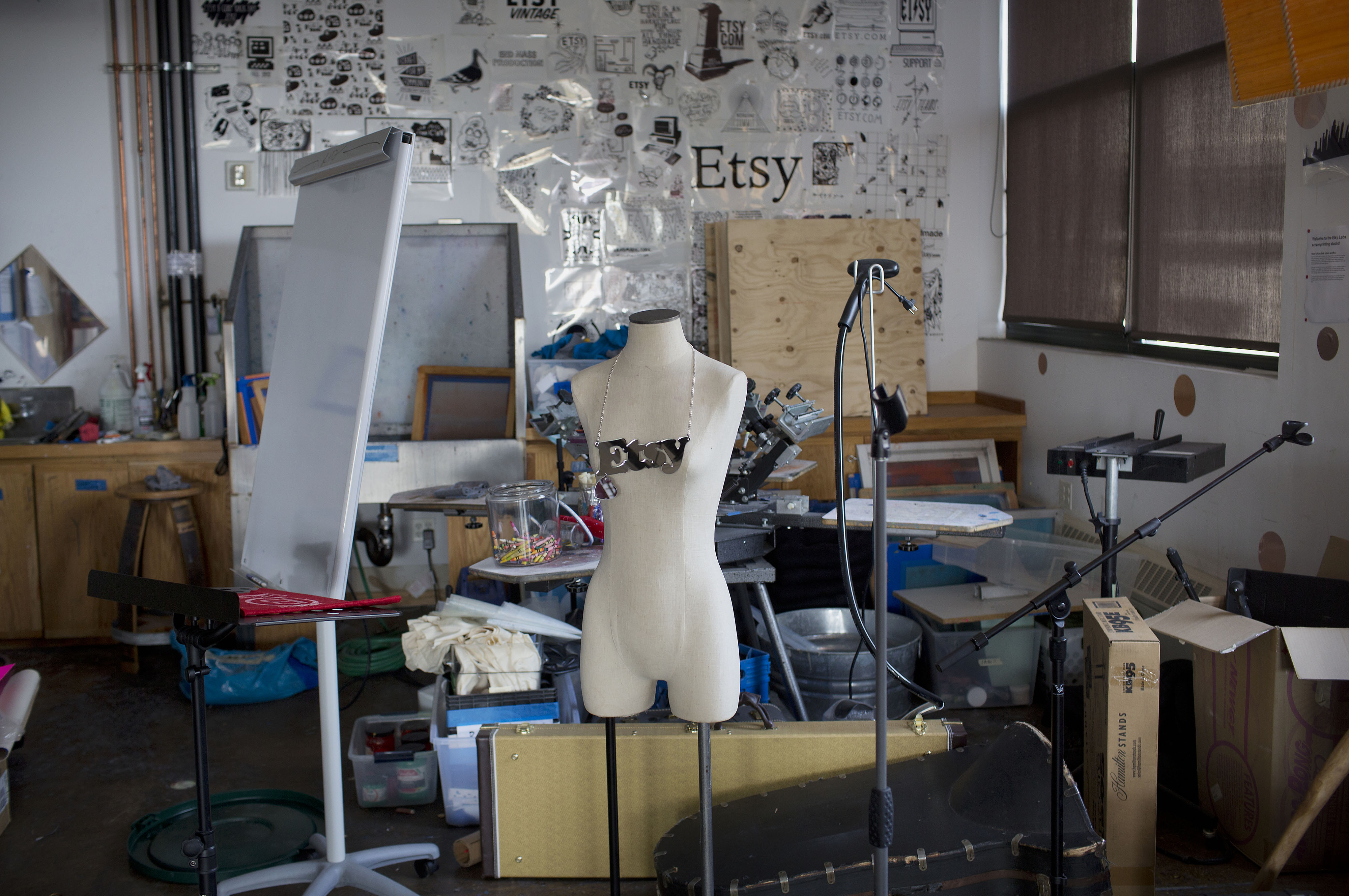 Caption:An Etsy necklace hangs on a mannequin in the craft lab at the company's headquarters in the Brooklyn borough of New York, U.S., on Monday, May 4, 2015. Etsy Inc., a marketplace for handmade and vintage goods, raised $267 million in its initial public offering. Photographer: Victor J. Blue/Bloomberg via Getty Images