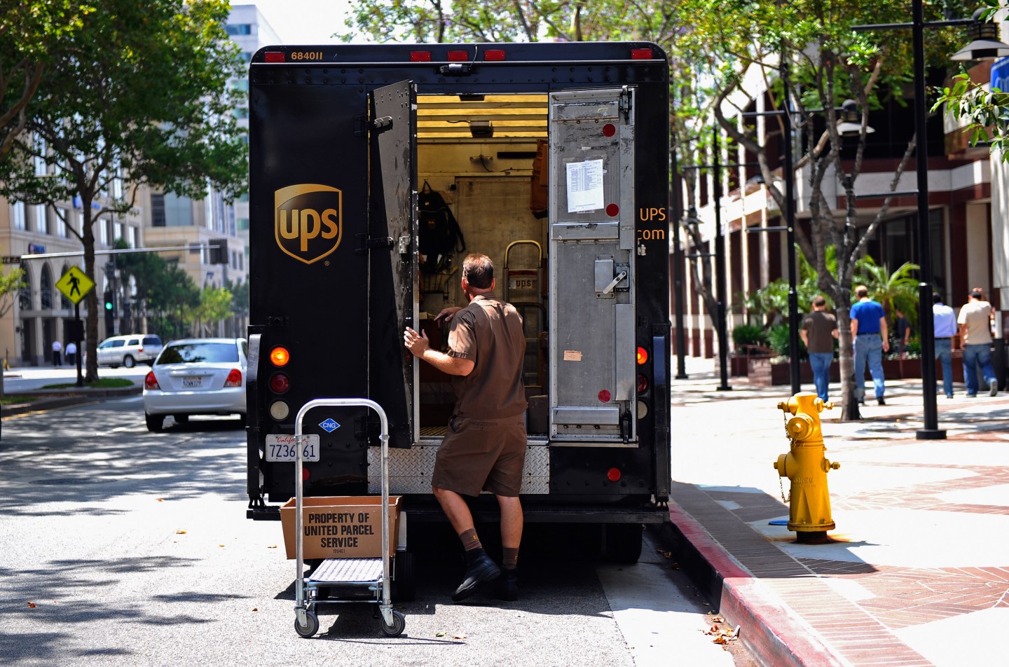 UPS's Income Rises 90 Percent
