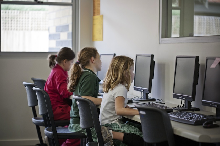 School children in classroom.