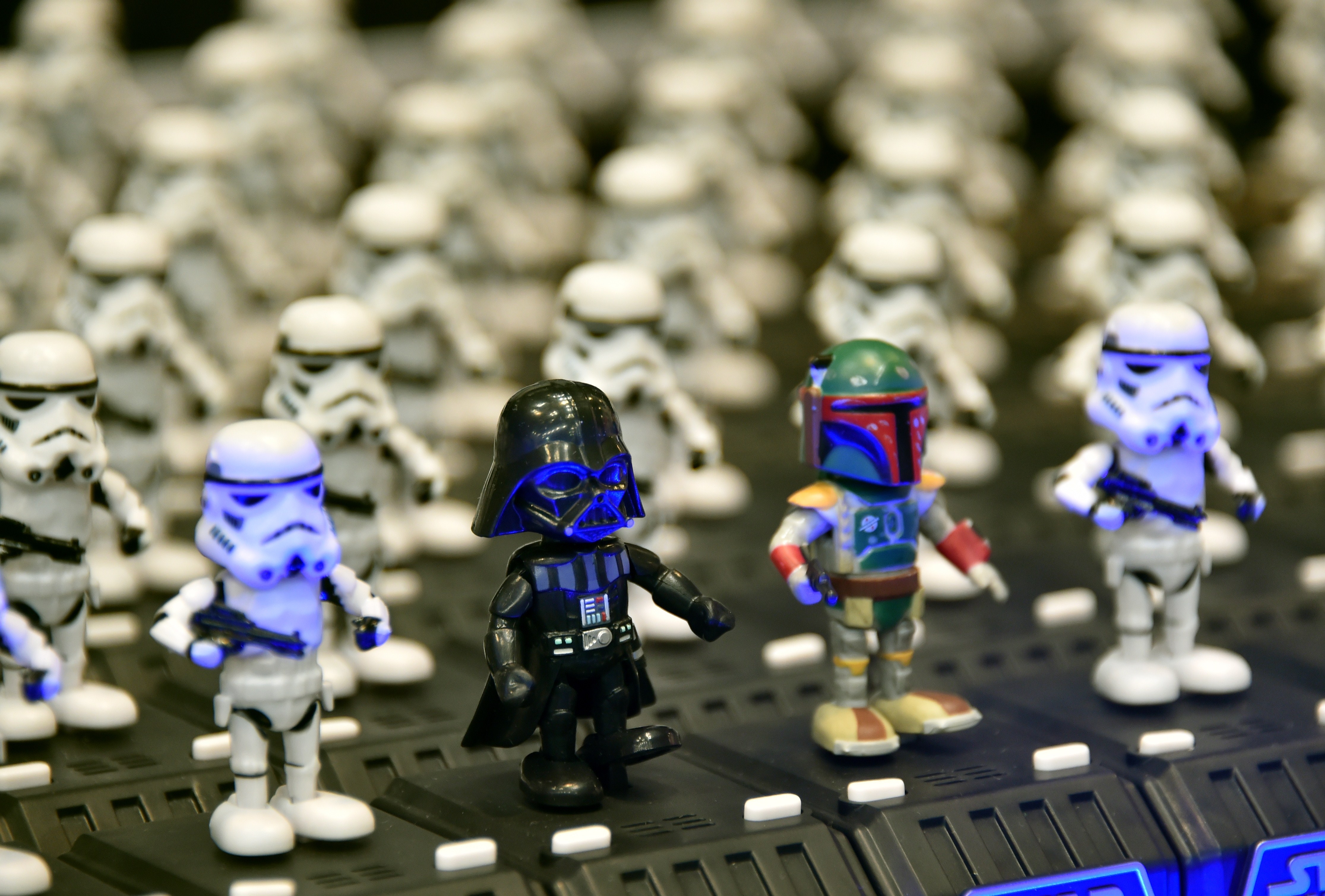 Dancing figurine toy characters of "Star Wars Space Opera", produced by Japanese toy maker Tomy are displayed at the annual Tokyo Toy Show in Tokyo on June 18, 2015. Disney will be launching the new line of Star Wars toys in a global toy unboxing event on September 4.