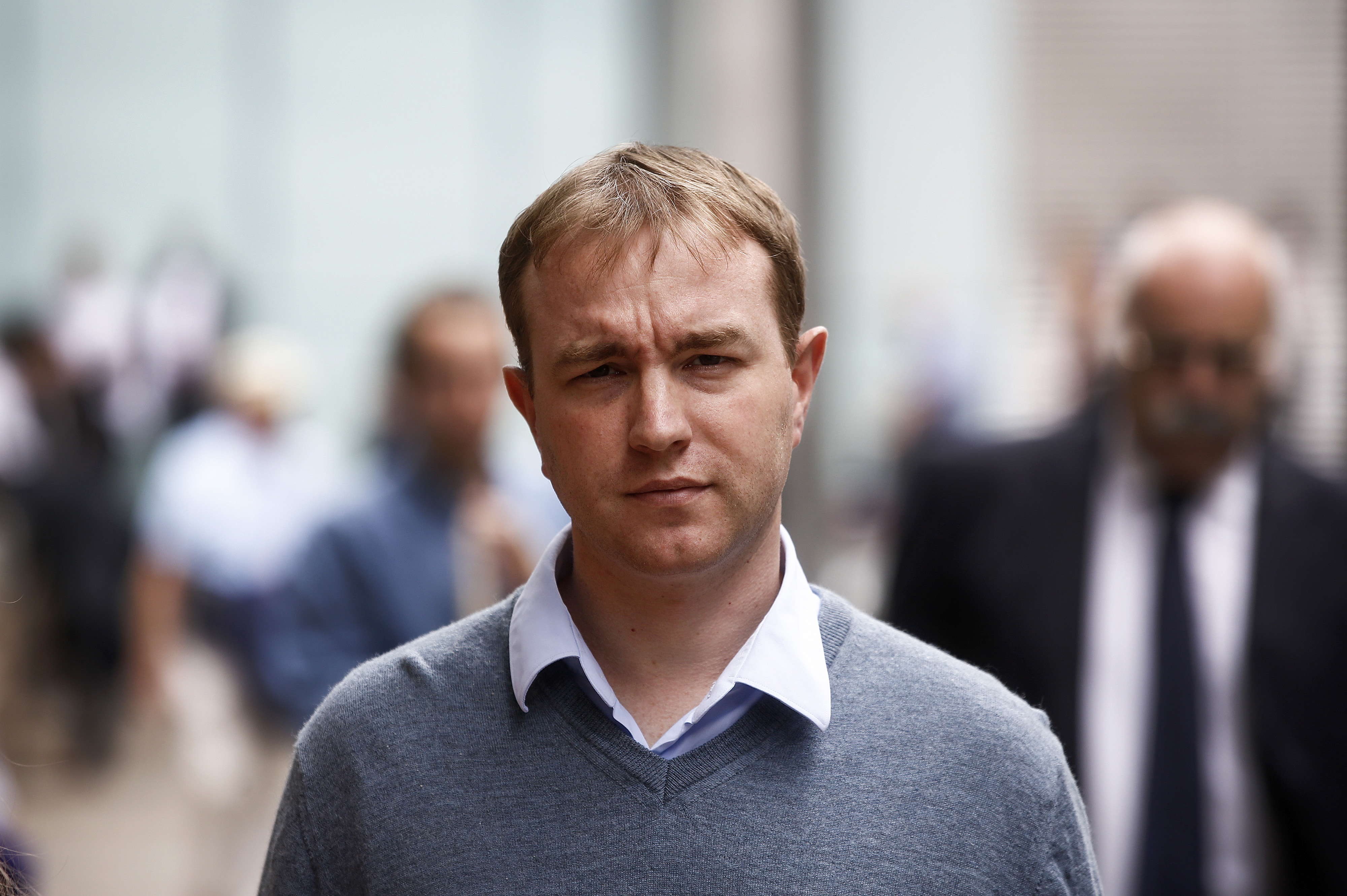 Thomas 'Tom' Hayes, a former trader at banks including UBS Group AG and Citigroup Inc., leaves for lunch during for his trial at Southwark Crown Court in London, U.K., on Monday, Aug. 03, 2015. Hayes, the first person to stand trial for manipulating Libor, was found guilty of eight counts of conspiracy to rig the benchmark rate. Photographer: Simon Dawson/Bloomberg *** Local Caption *** Tom Hayes