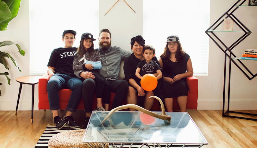 Tran Wills and her family (from left to right): Noah, Elliot, Josh, Tran, Hesh on her lap, and Quynh.