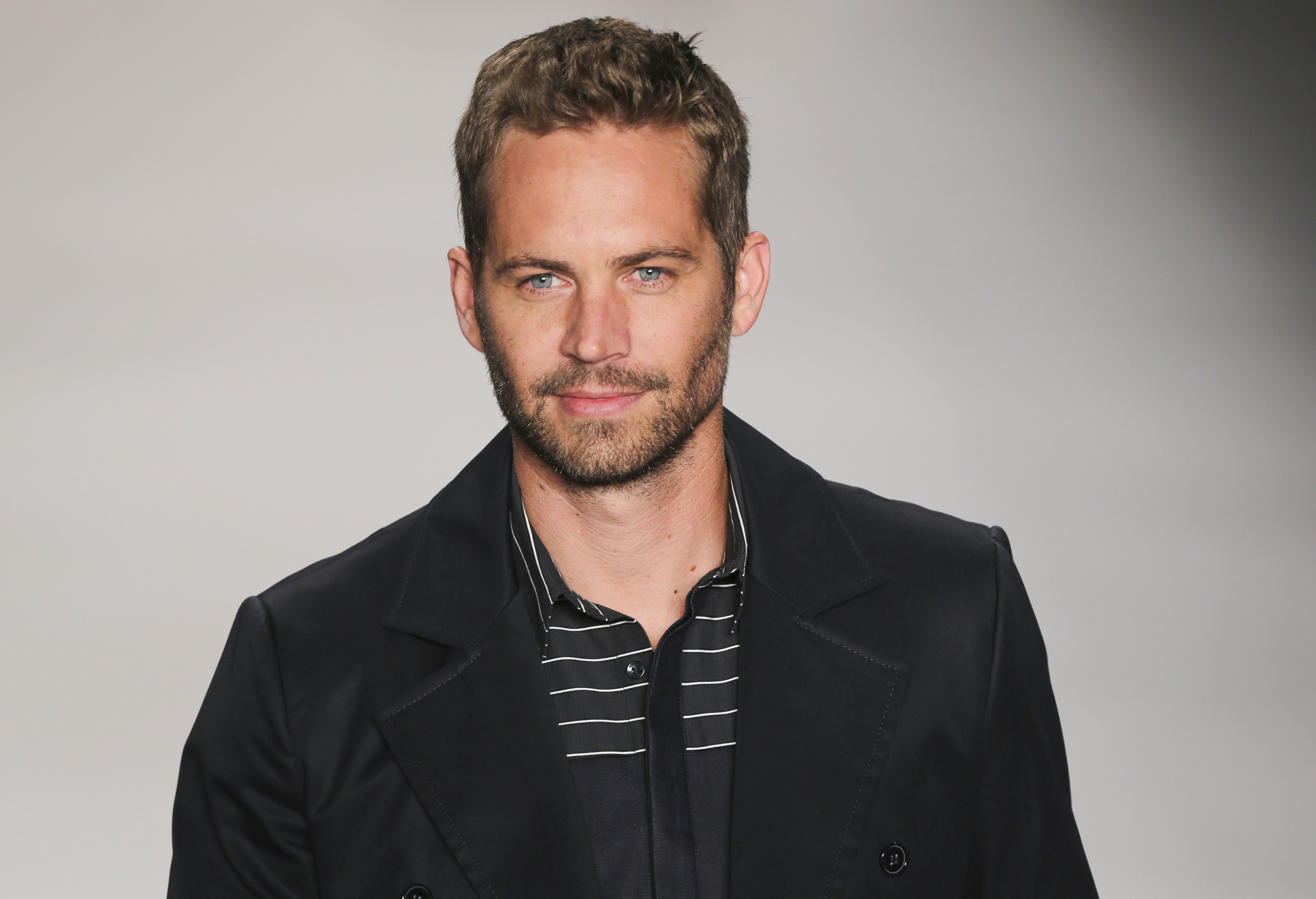 SAO PAULO, BRAZIL - MARCH 21: Actor Paul Walker walks the runway at the Samuel Cirnansck show during Sao Paulo Fashion Week Summer 2013/2014 on March 21, 2013 in Sao Paulo, Brazil. (Photo by William Volcov/BrazilPhotoPress/LatinContent/Getty Images)