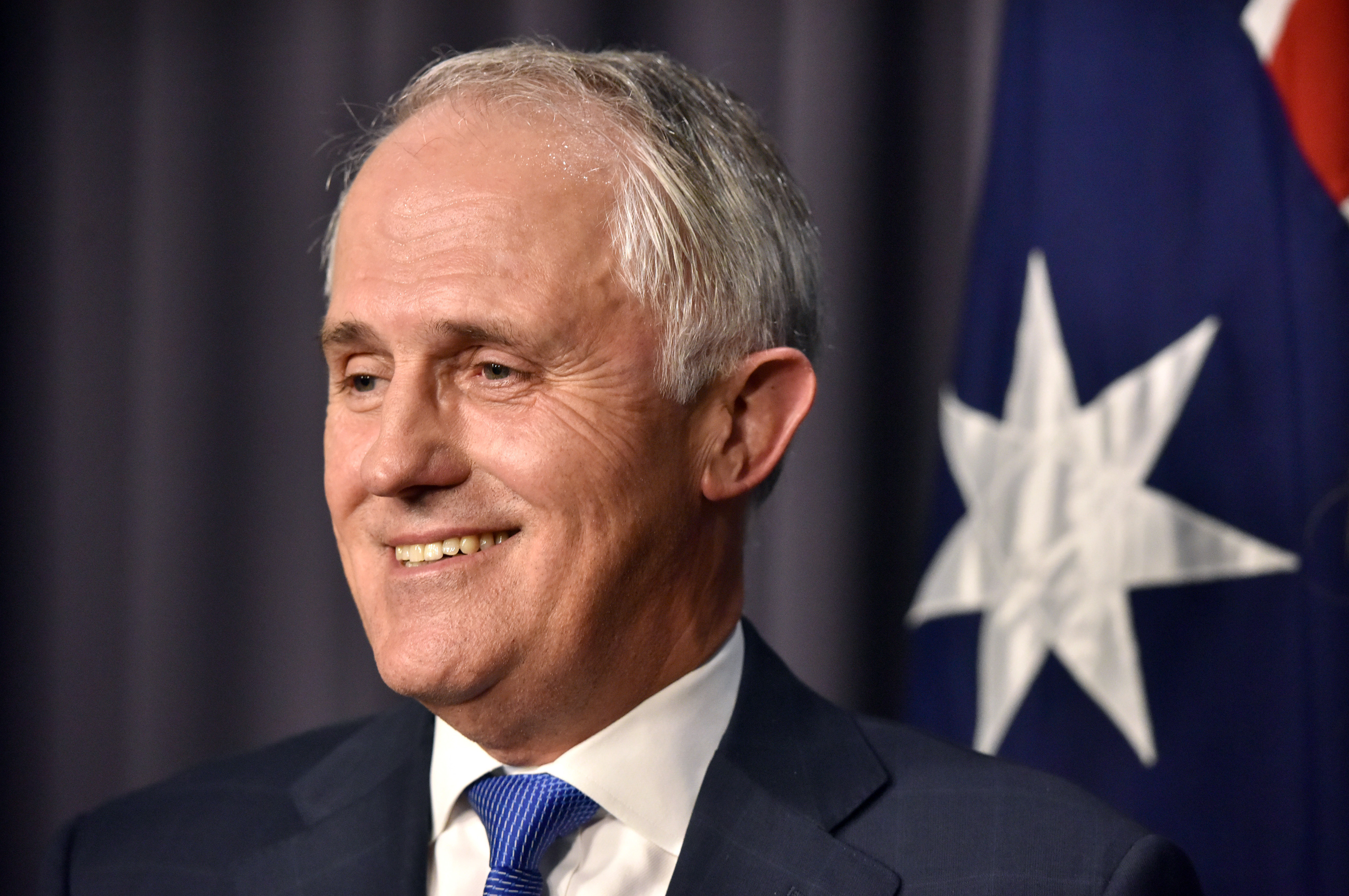 Malcolm Turnbull, Australia's incoming prime minister, reacts during a news conference after winning a party leadership ballot in Canberra, Australia, on Monday, Sept. 14, 2015. Turnbull will become Australia's sixth prime minister in eight years after defeating Tony Abbott in a ballot of Liberal Party lawmakers on Monday.