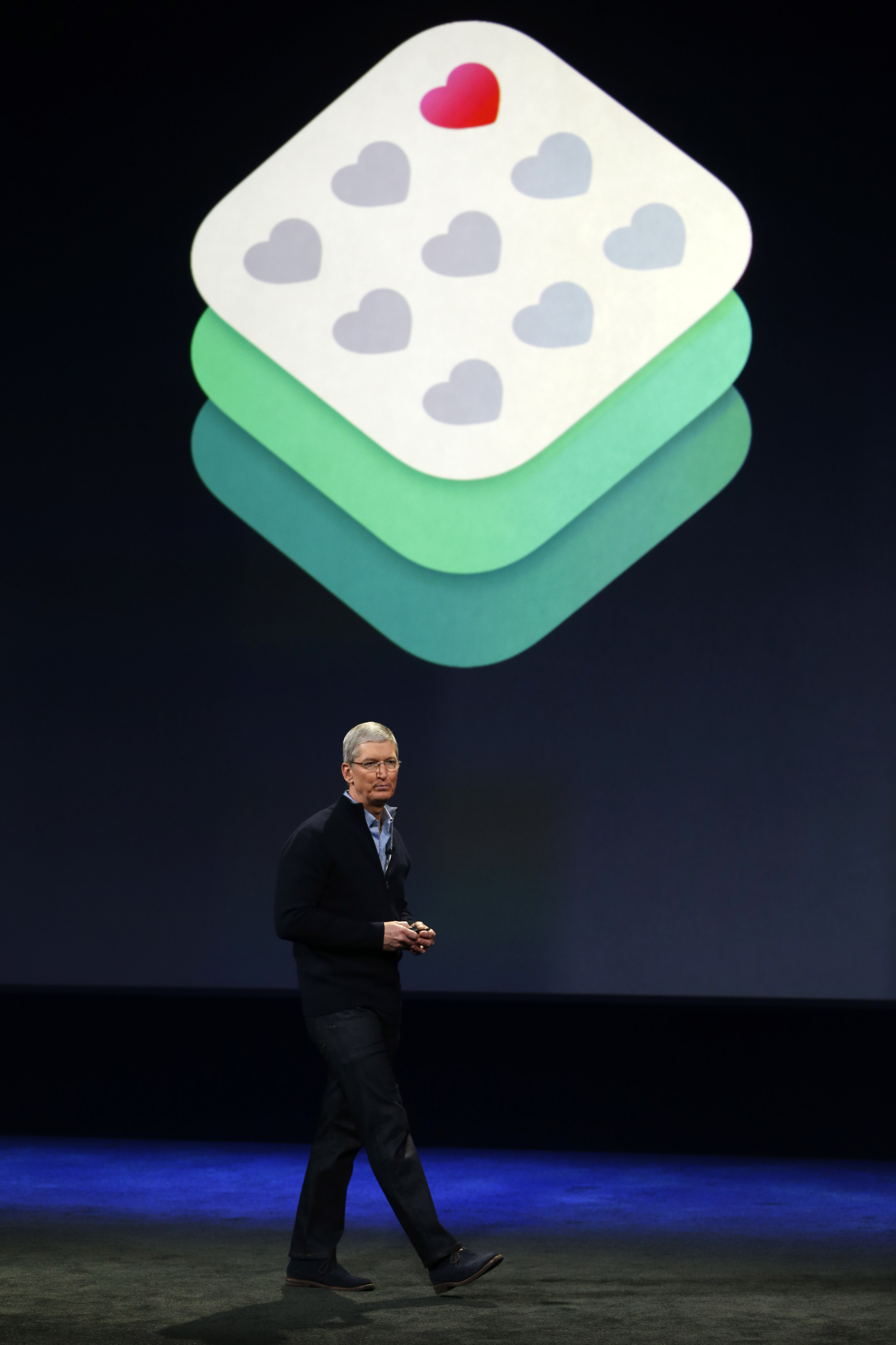 SAN FRANCISCO, CA - MARCH 9: Apple CEO Tim Cook stands in front of a ResearchKit logo during an Apple special event at the Yerba Buena Center for the Arts on March 9, 2015 in San Francisco, California. Apple Inc. announced the new MacBook as well as more details on the much anticipated Apple Watch, the tech giant's entry into the rapidly growing wearable technology segment as well (Photo by Stephen Lam/Getty Images)