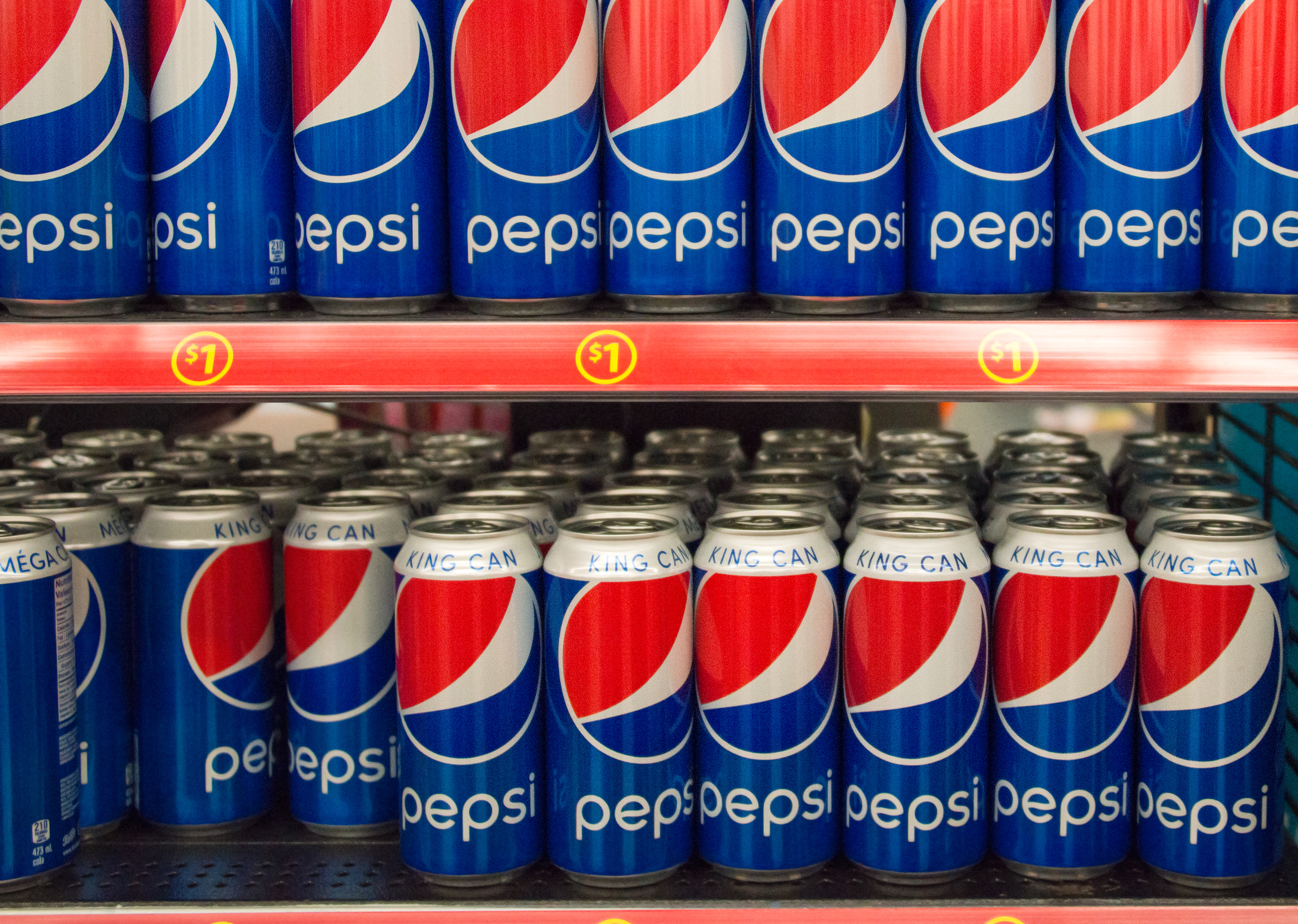 TORONTO, ONTARIO, CANADA - 2015/03/29: Pepsi Cola King Can on Store Shelf; Pepsi is a carbonated soft drink that is produced and manufactured by PepsiCo. and distributed all over the world. (Photo by Roberto Machado Noa/LightRocket via Getty Images)