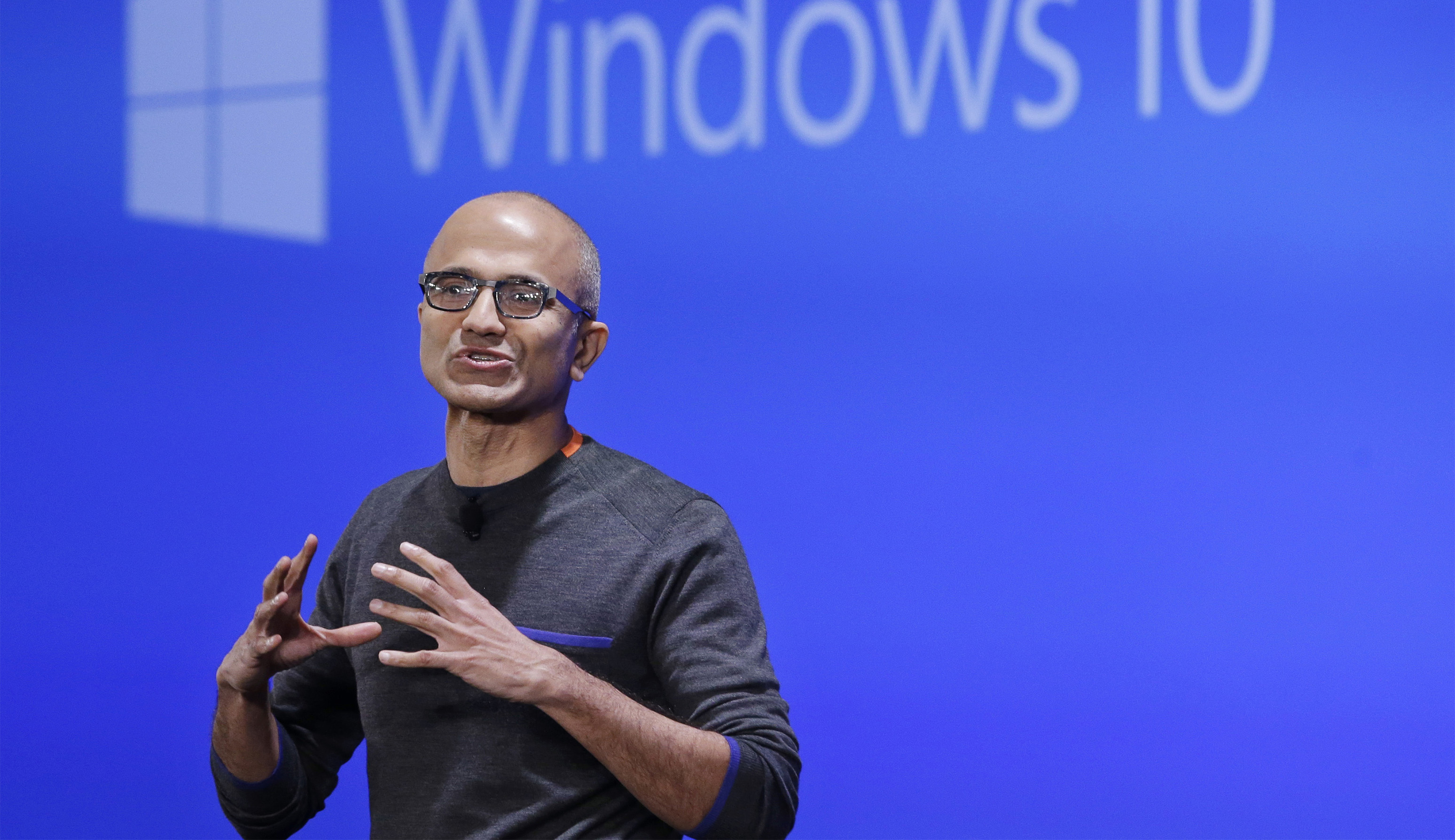 FILE - In this Jan. 21, 2015, file photo, Microsoft CEO Satya Nadella speaks at an event demonstrating the new features of Windows 10 at the company's headquarters in Redmond, Wash. When Chinese President Xi Jinping arrives in Washington state on his way to the other Washington (Washington, D.C.), he’ll be visiting the American state that does more business with his country than any other. Washington companies sold China more than $20 billion in products last year, from airplanes to wheat and apples. (AP Photo/Elaine Thompson, File)