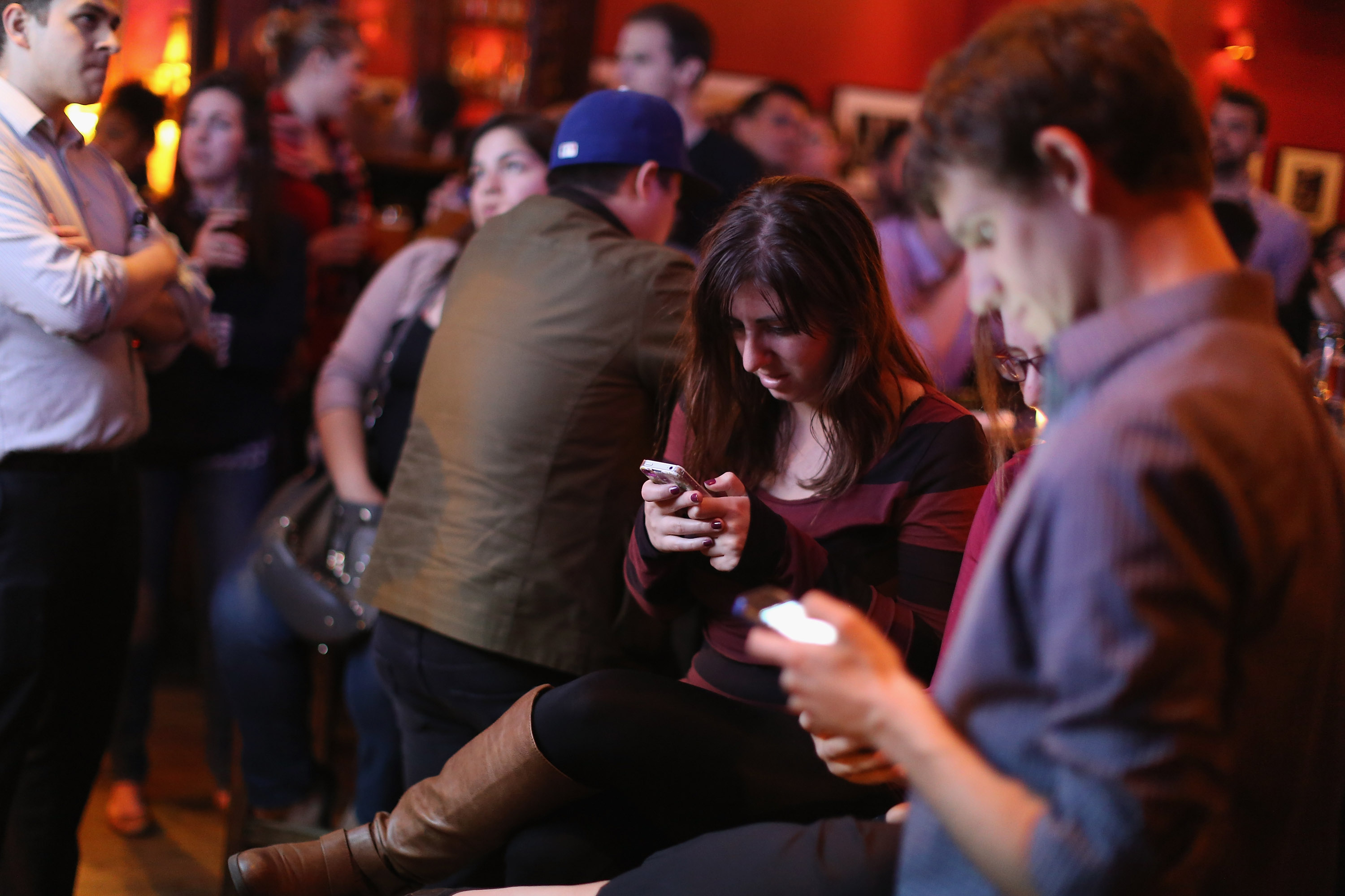 Young adults at a party at the Local 16 bar and restaurant Oct. 13, 2015 in Washington, DC.