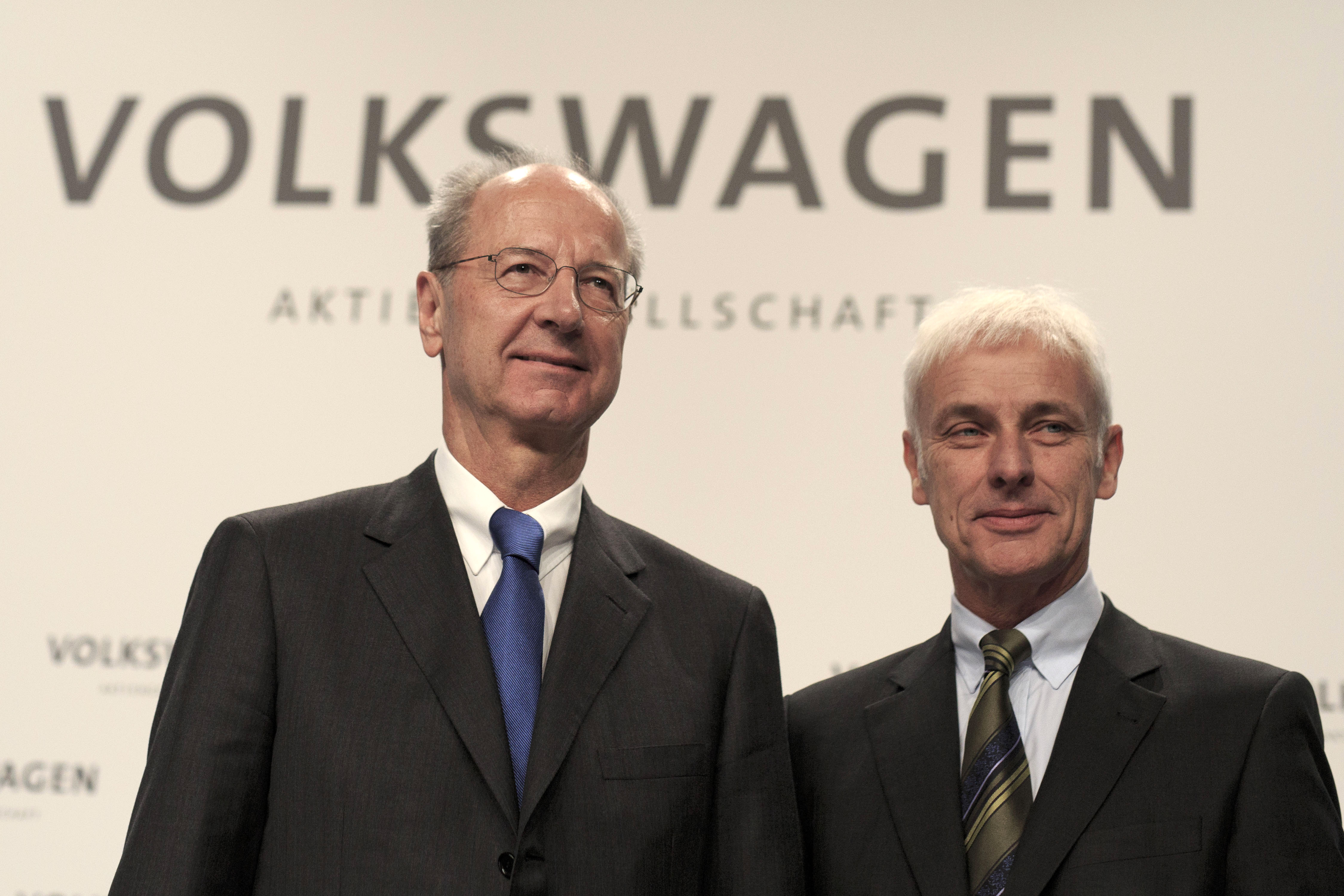WOLFSBURG, GERMANY - DECEMBER 10: Hans Dieter Poetsch (L), Chairman of the Supervisory Board of Volkswagen AG, and Volkswagen Group Chairman Matthias Mueller (R), arrive to the press conference to announce the latest update in the company's handling of the engine emissions scandal on December 10, 2015 in Wolfsburg, Germany. Volkswagen is continuing to grapple with the consequences after it admitted installing software that cheats during emissions tests into 11 million of its diesel cars sold worldwide. (Photo by Carsten Koall/Getty Images)