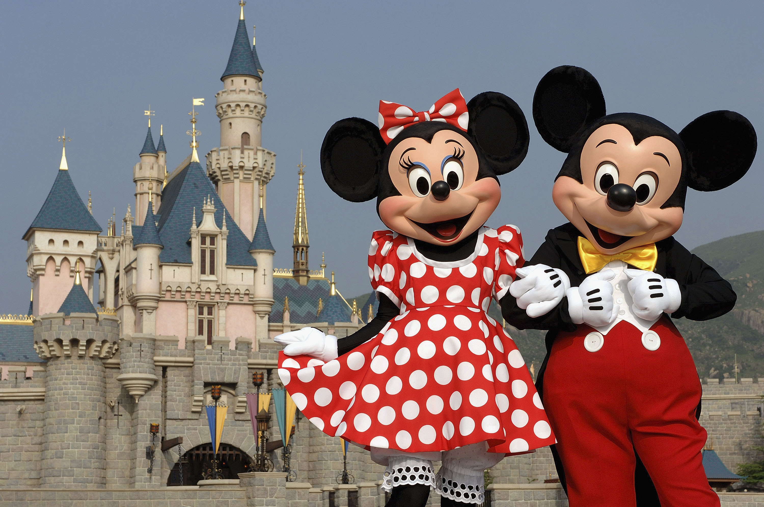 In a photo taken Sept. 1, 2005, Mickey Mouse and Minnie Mouse are seen in front of Sleeping Beauty Castle at Hong Kong Disneyland Park. The new theme park and vacation resort will officially open Sept. 12, 2005. Hong Kong Disneyland Resort is a family entertainment and recreation center consisting of a full-day, Disneyland-style theme park, two Disney hotels and a lakeside recreation center. (Mark Ashman, photographer)