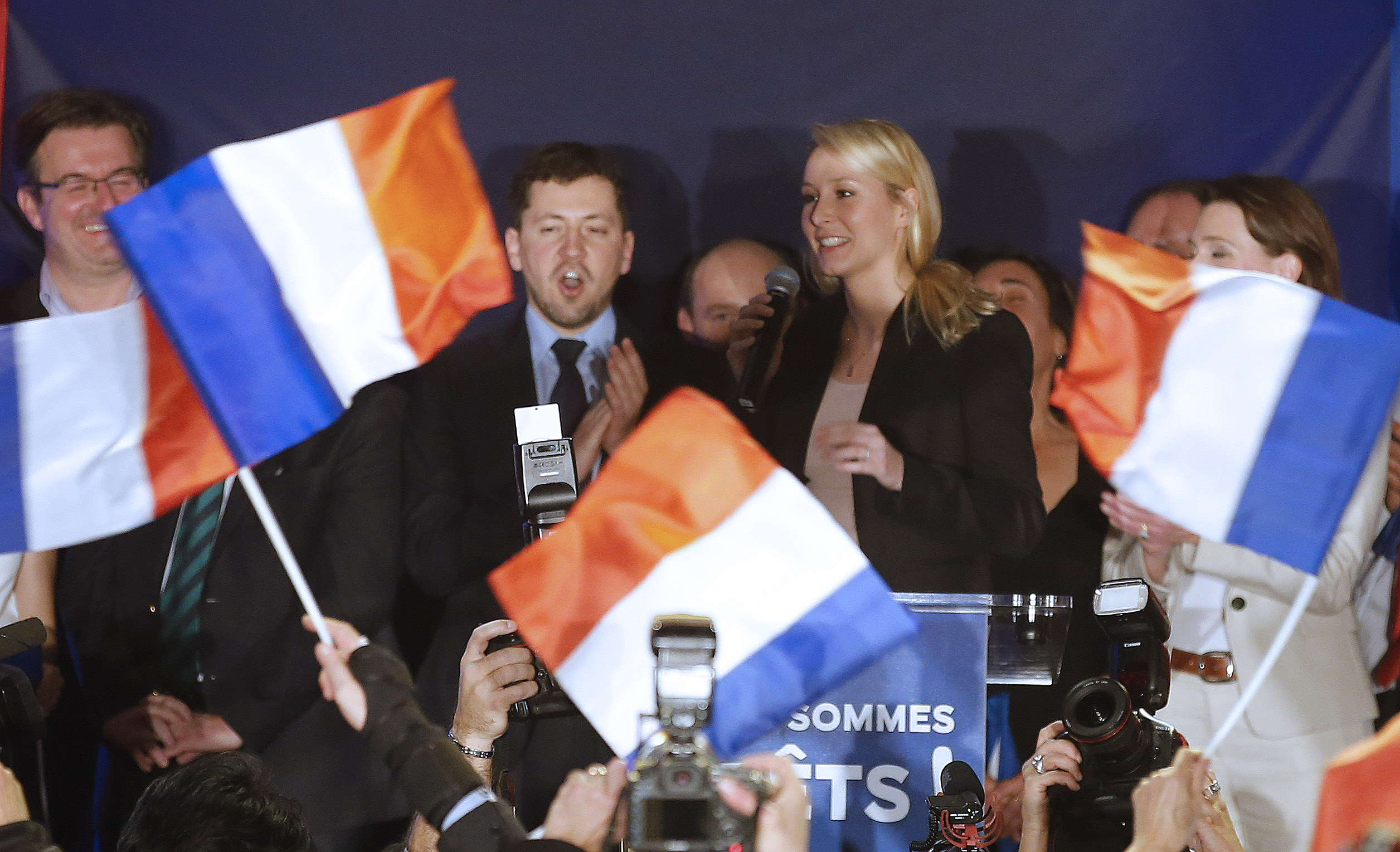 Marion Marechal-Le Pen, French National Front political party member and candidate for National Front in the PACA region arrives to deliver her speech in Le Pontet