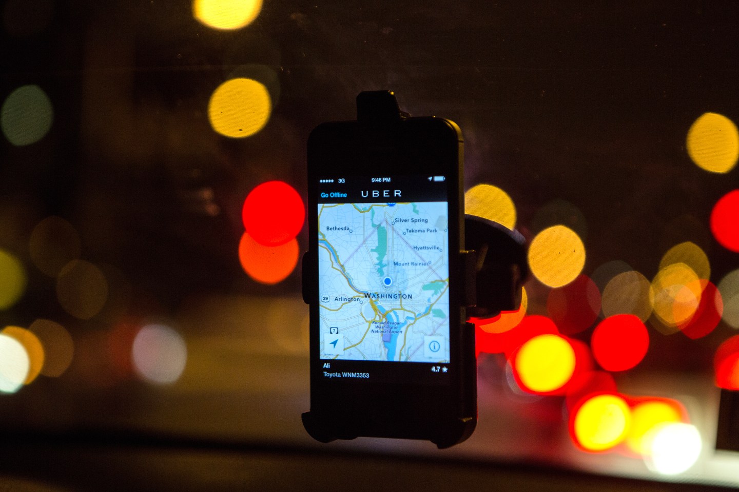 WASHINGTON, DC - APR 4: The Uber driver app on the windshield