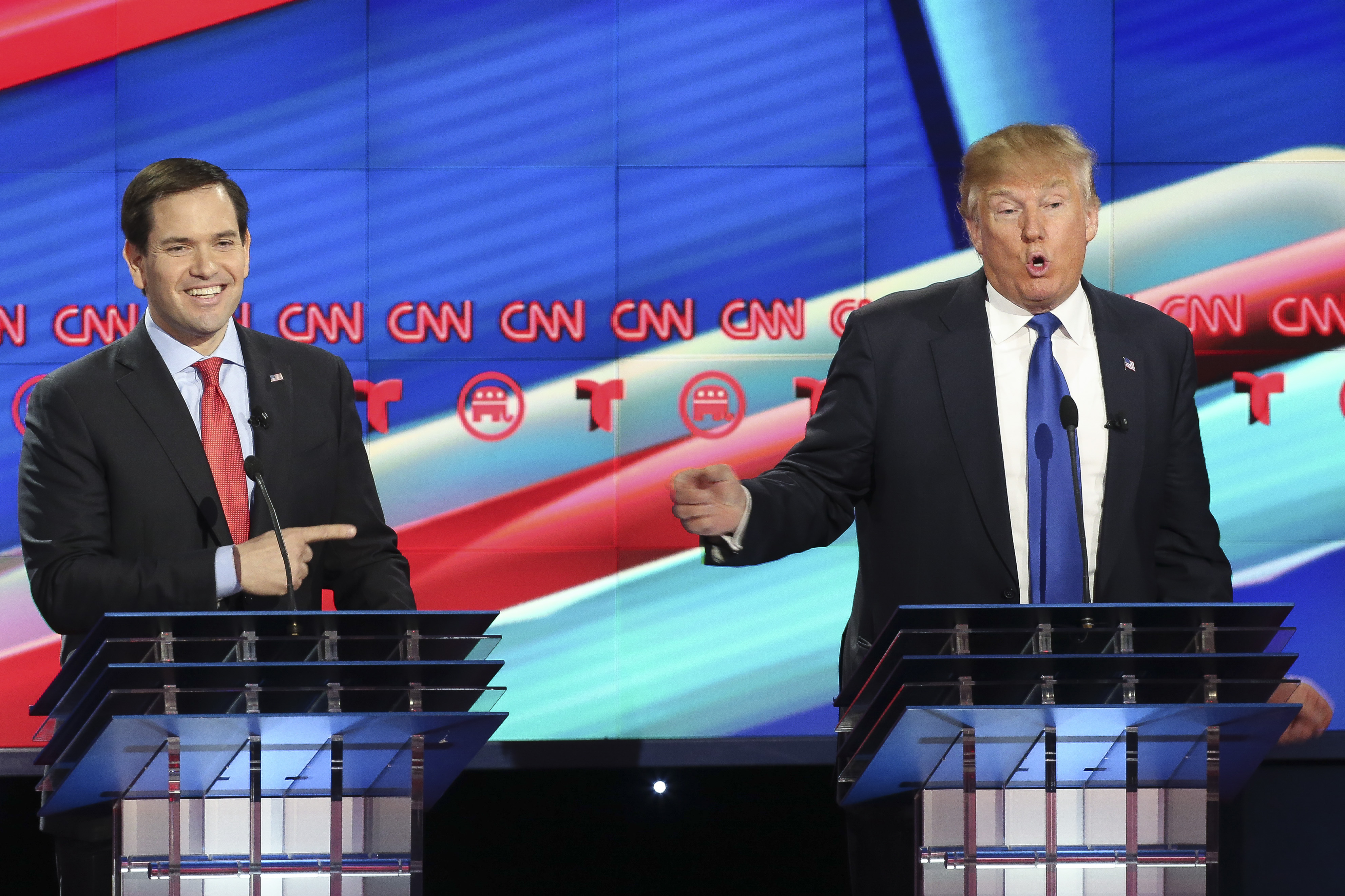 Marco Rubio, left, listens as Donald Trump answers a question during the Republican Presidential Primary Debate at the University of Houston Thursday, Feb. 25, 2016. ( Gary Coronado / Houston Chronicle )