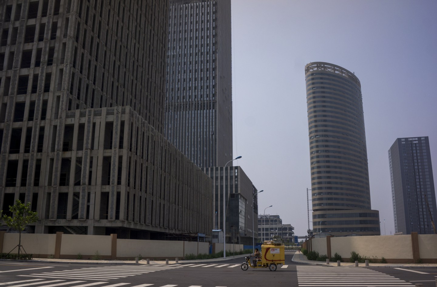 Unfinished buildings and vacant streets in Xiangluo Bay.