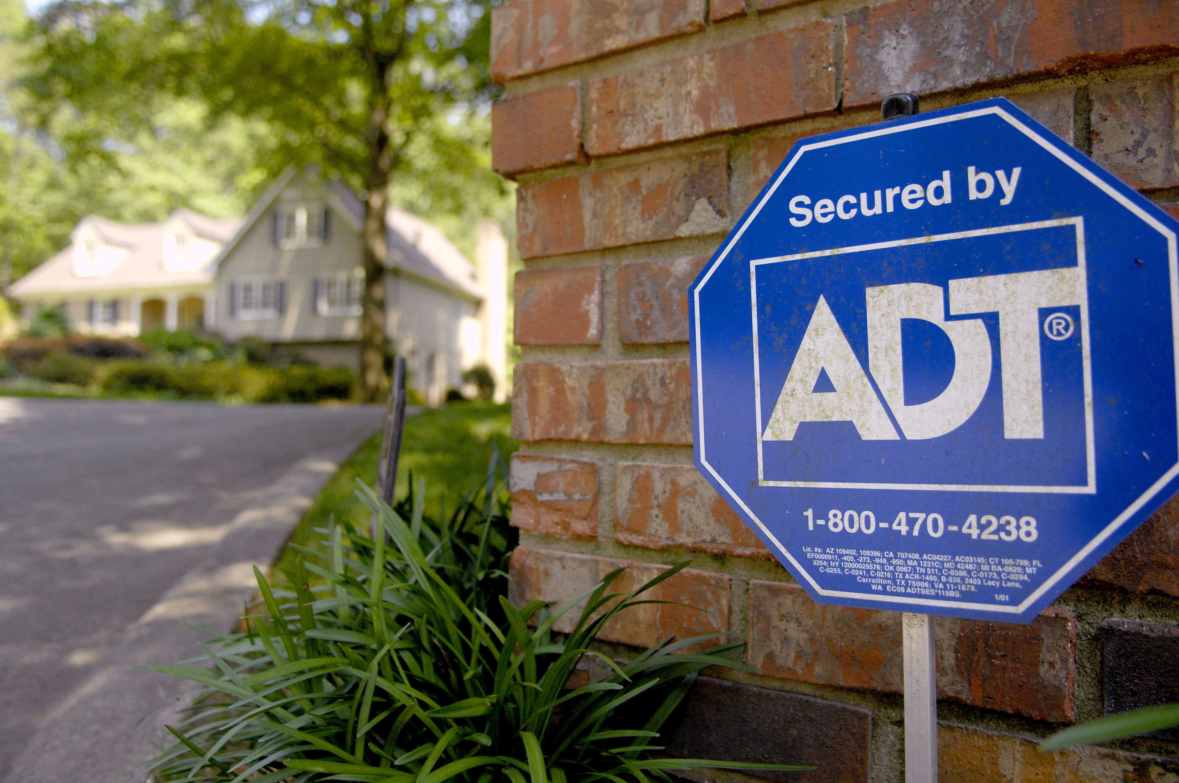 An ADT Security sign sits out in front of a home in Sandy Sp