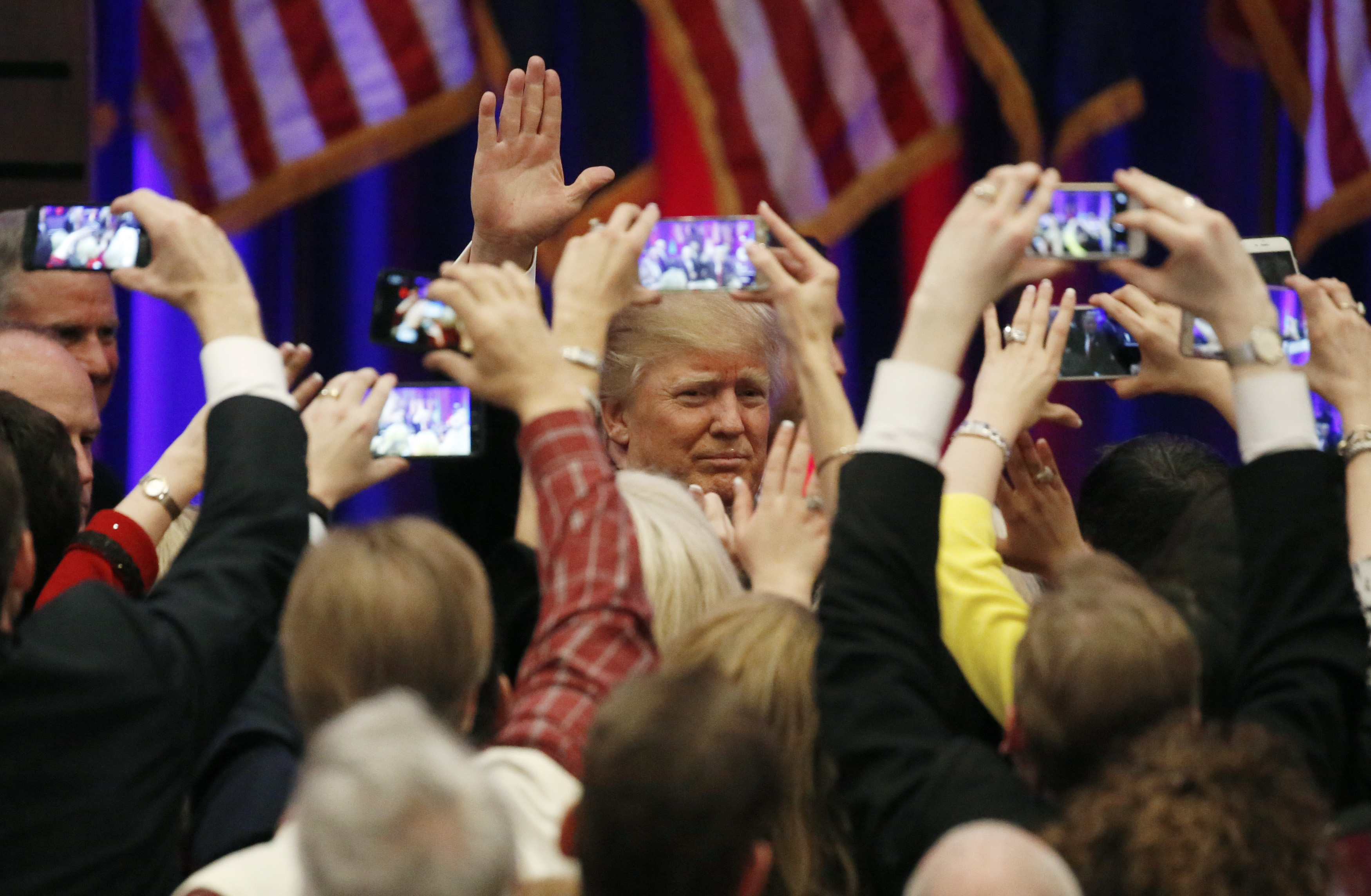 Republican U.S. presidential candidate Donald Trump greets supporters after speaking at his 2016 South Carolina presidential primary night victory rally in Spartanburg