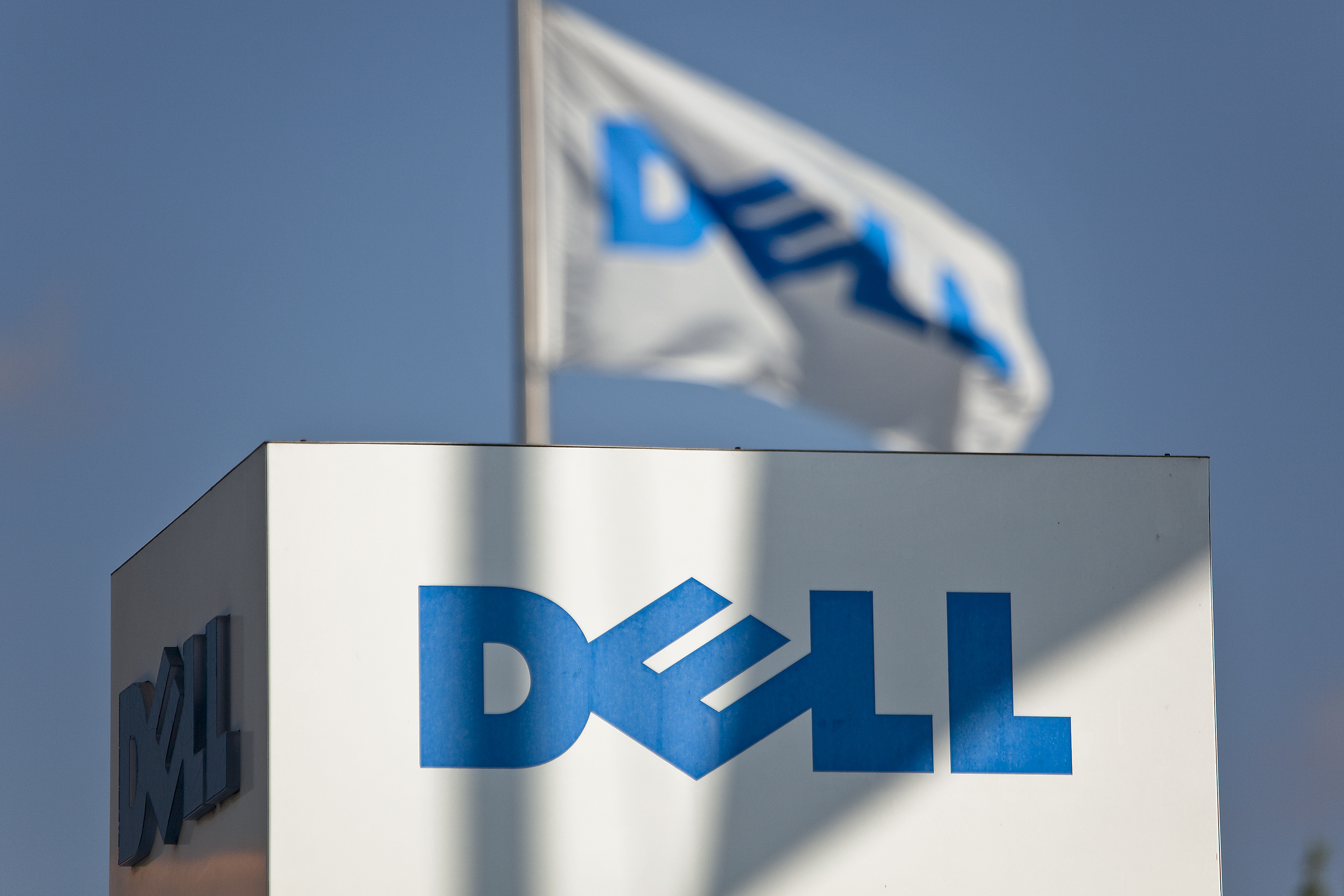 A Dell flag flies on the headquarters campus of Dell Inc. in