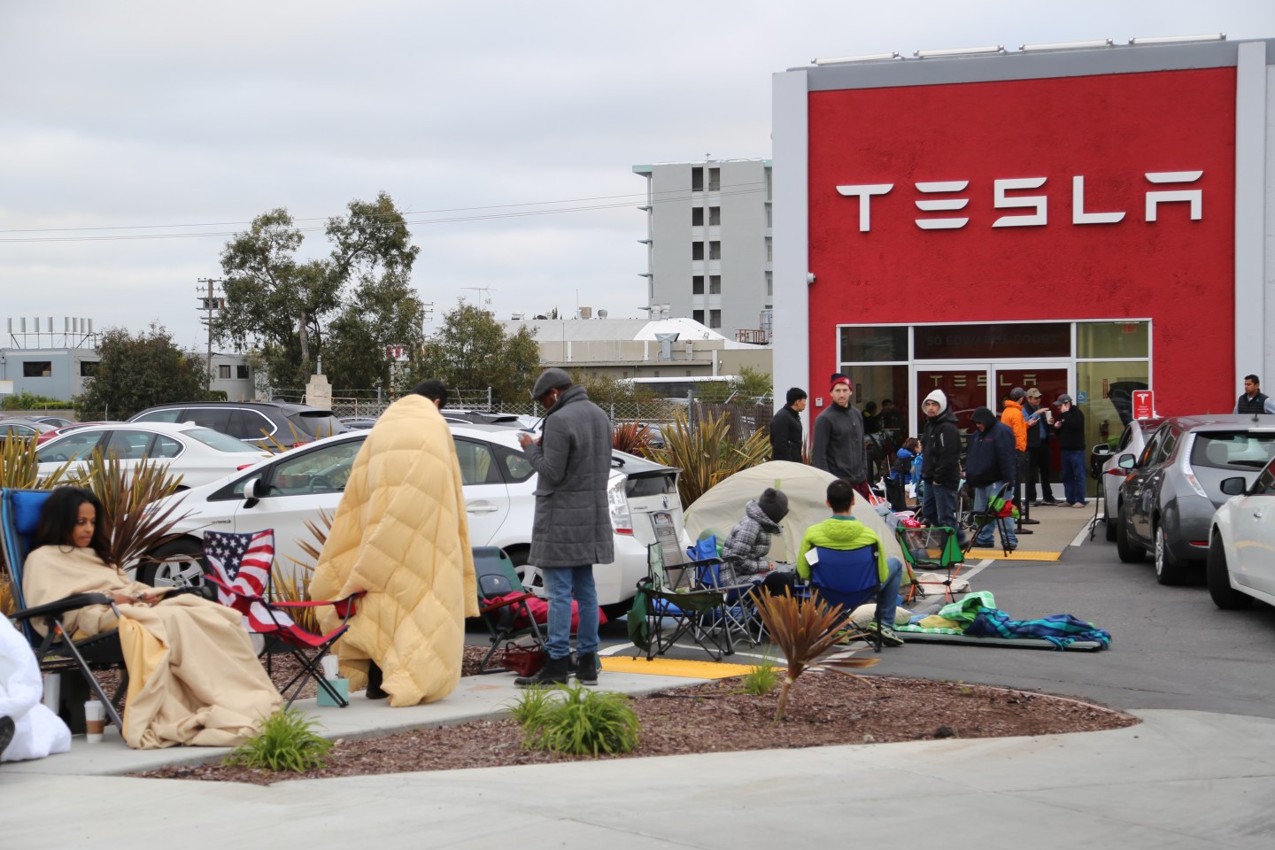 Tesla Fans Eagerly Camp and Wait for the Model 3